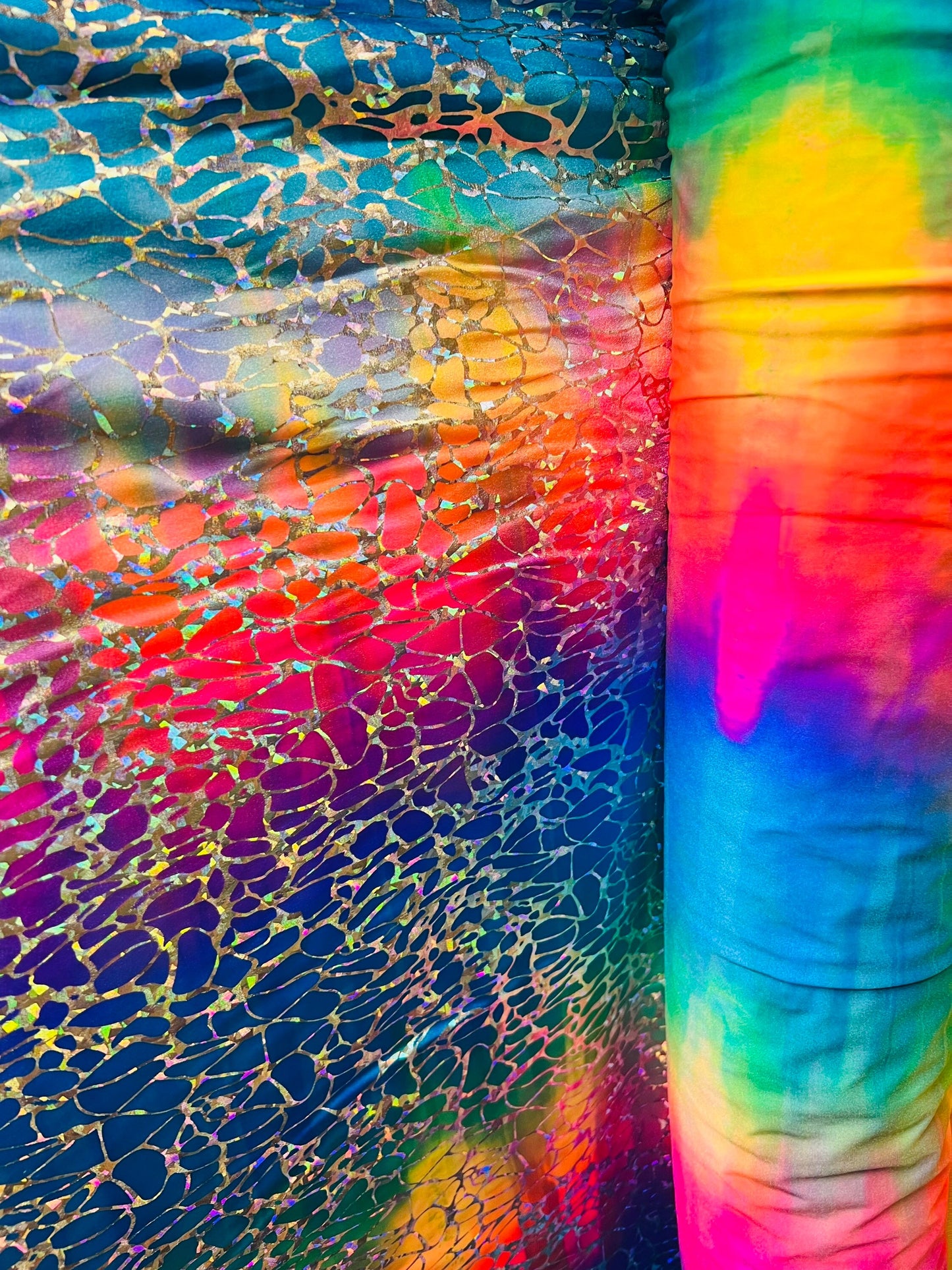 Spider design hologram metallic nylon spandex 4-way stretch 58/60” Sold by the YD. Ships Worldwide from Los Angeles California USA