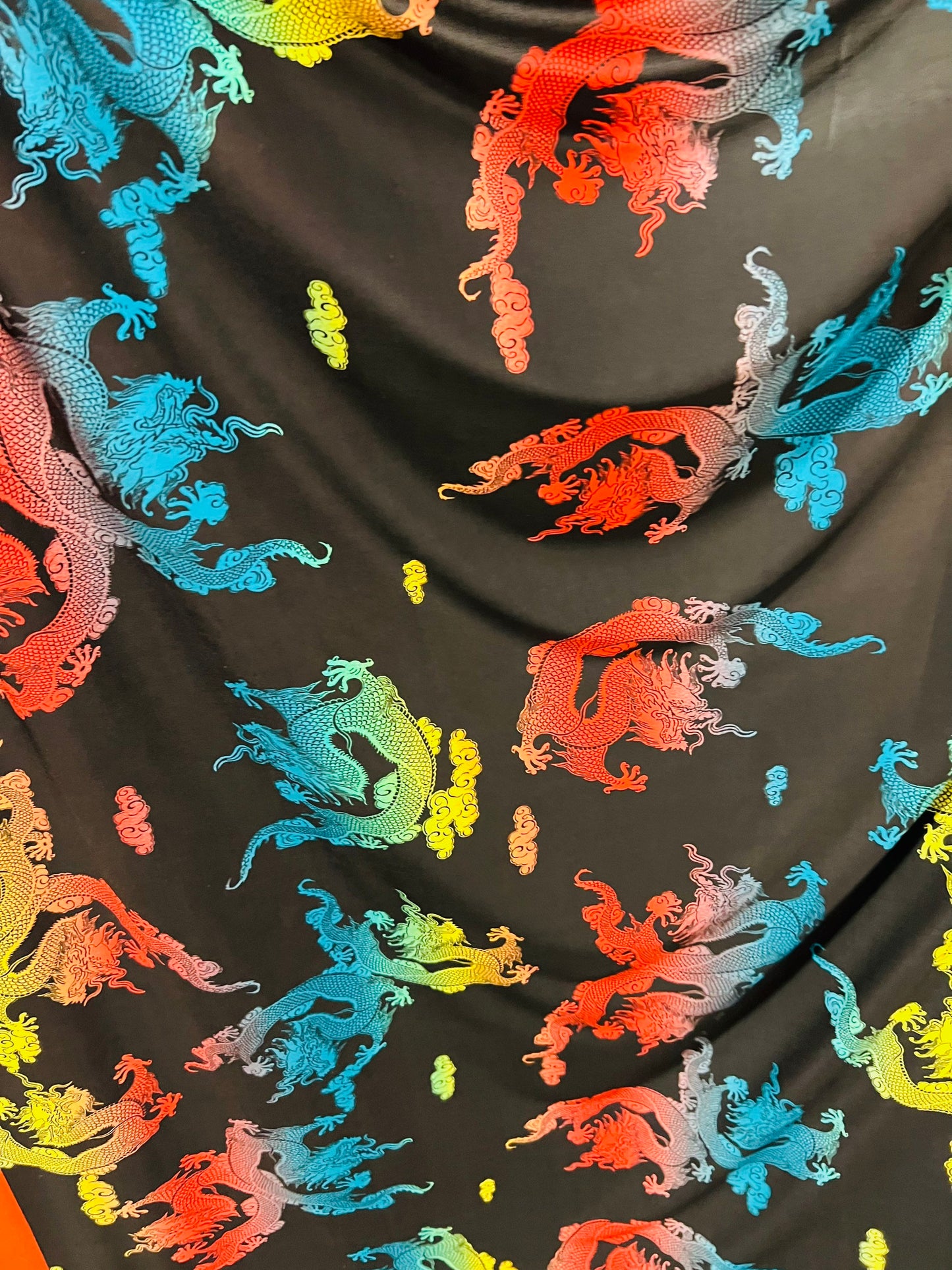 Exotic dragon design print on poly spandex light weight 4-way stretch 58/60” Sold by the YD. Ships Worldwide from Los Angeles California USA