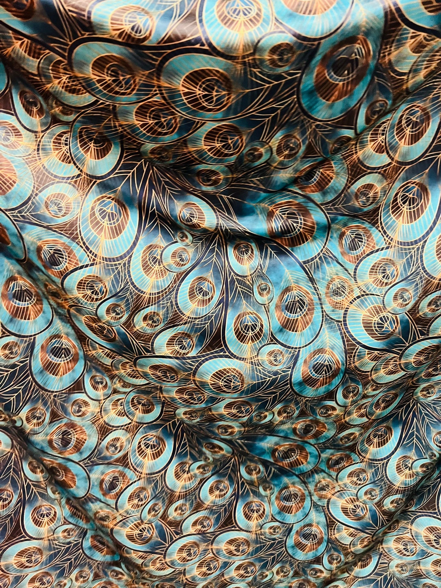Peacock design New print in stock Teal blue/Gold print on great quality of nylon spandex 4-way stretch 58/60”