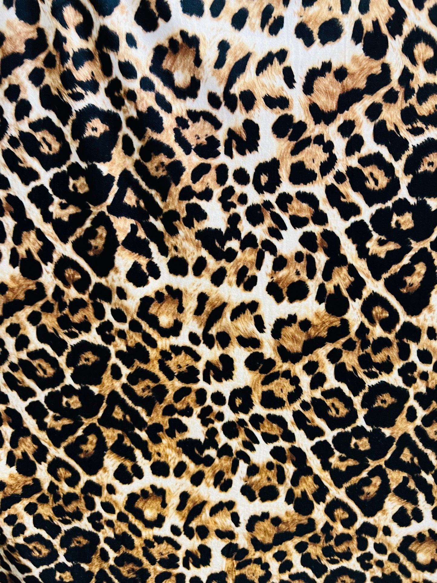 Leopard design Exotic animal print Taupe/Brown print on poly stretch velvet velour 2-way 58/60” Sold by the YD. Ships Worldwide from L.A