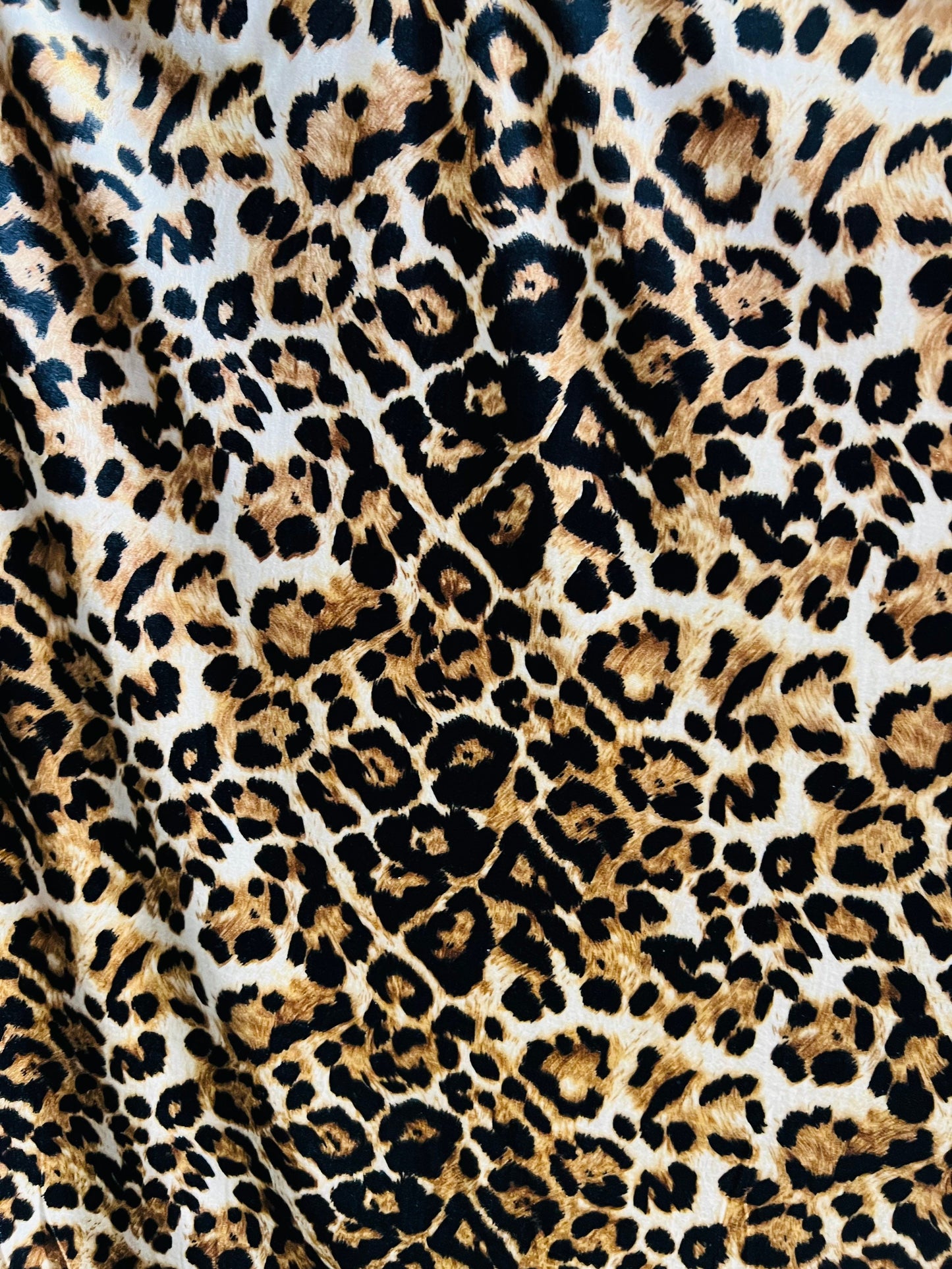 Leopard design Exotic animal print Taupe/Brown print on poly stretch velvet velour 2-way 58/60” Sold by the YD. Ships Worldwide from L.A