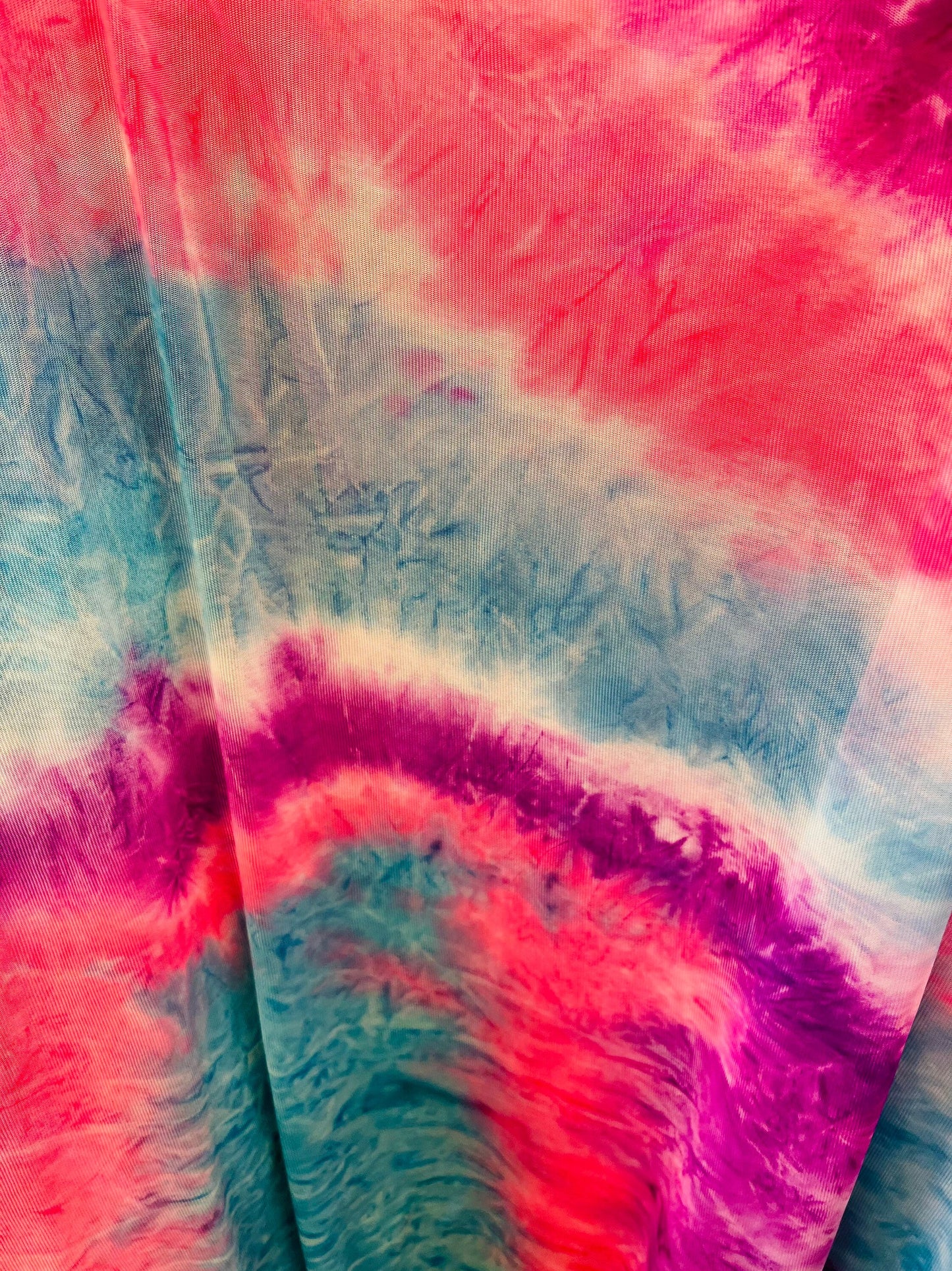 Tie dye design power mesh 4-way stretch 58/60” Sold by the YD. Ships Worldwide from Los Angeles California USA.