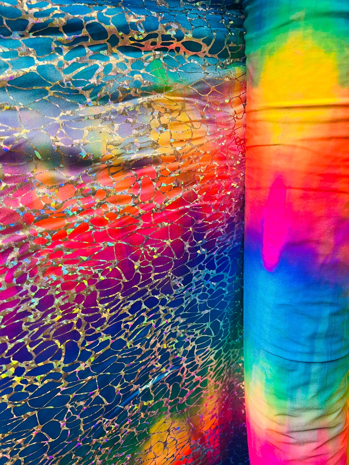 Tie dye Hologram metallic foil on nylon spandex 4way stretch 58/60" Sold by the YD. Ships worldwide from Los Angeles California USA