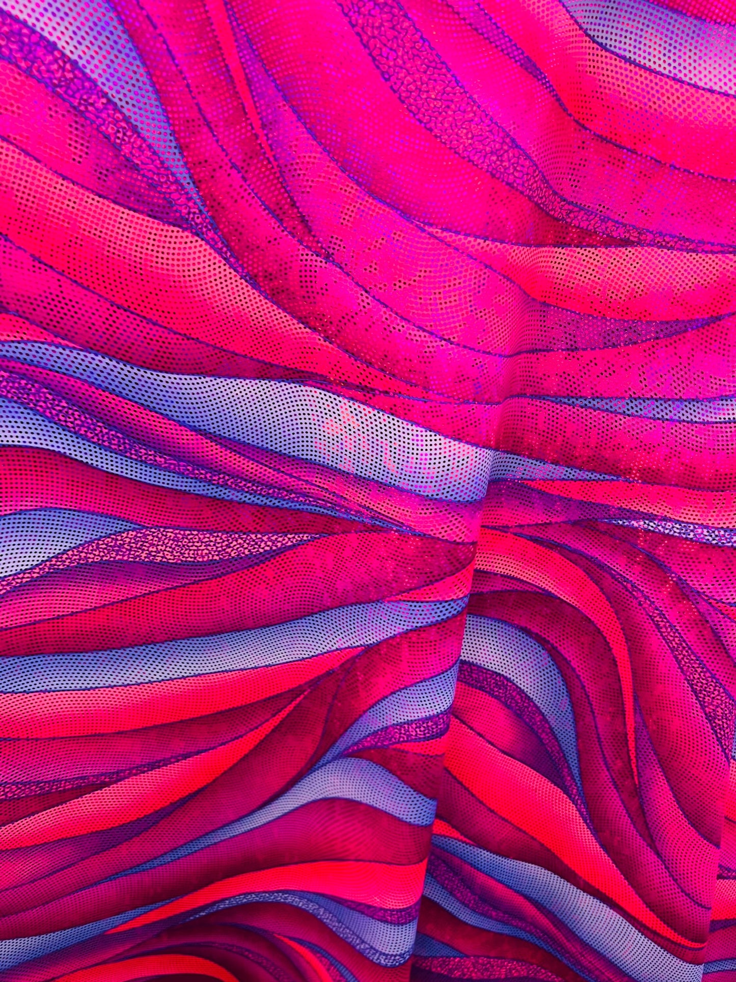 New hologram abstract design metallic nylon spandex 4-way stretch 58/60” Sold by the YD. Ships Worldwide from Los Angeles California USA