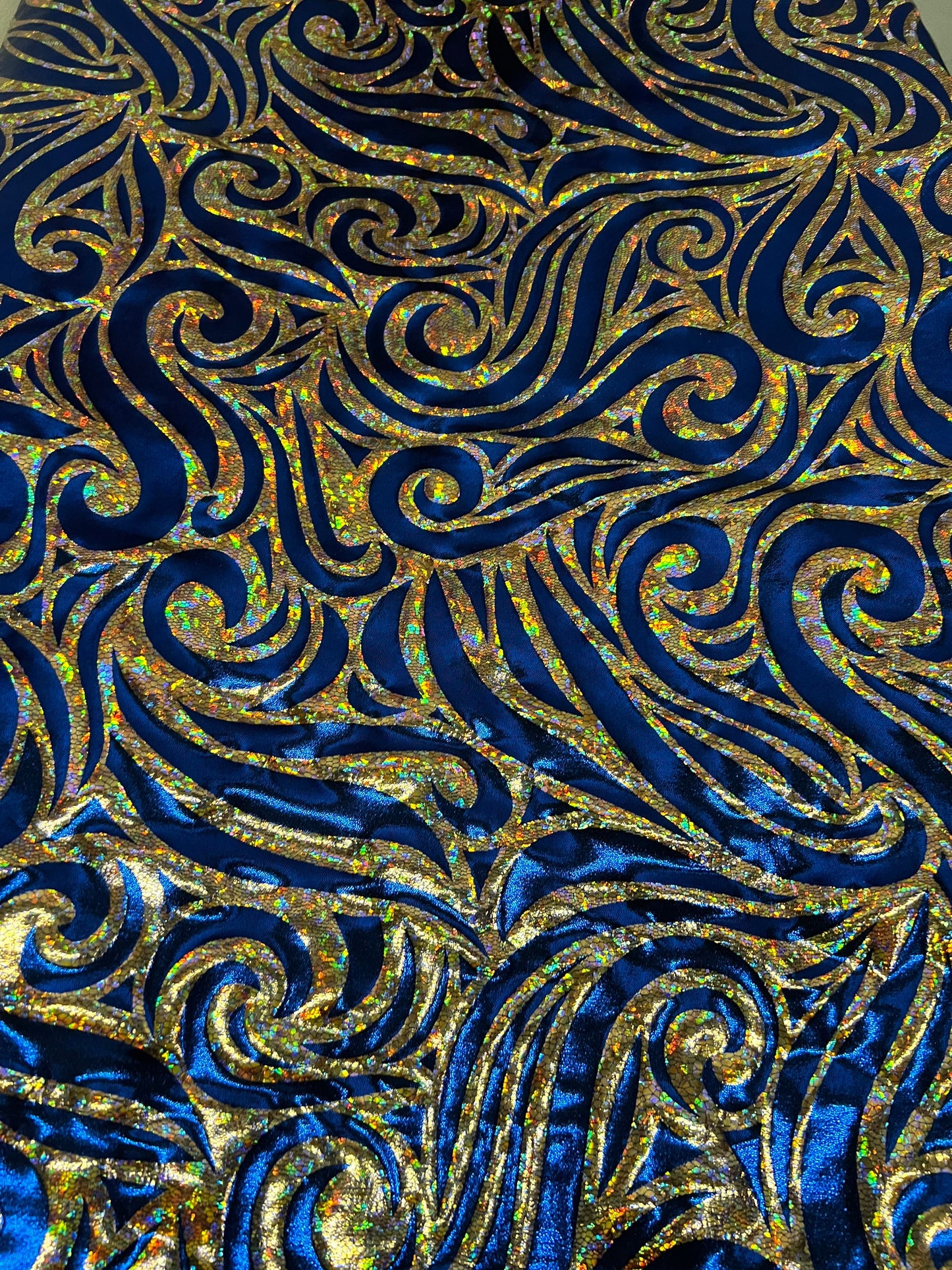 Rolex Luxury swirl design hologram metallic nylon spandex 4-way stretch Midnight Blue/Gold 58/60” Sold by the YD. Ships Worldwide from L.A