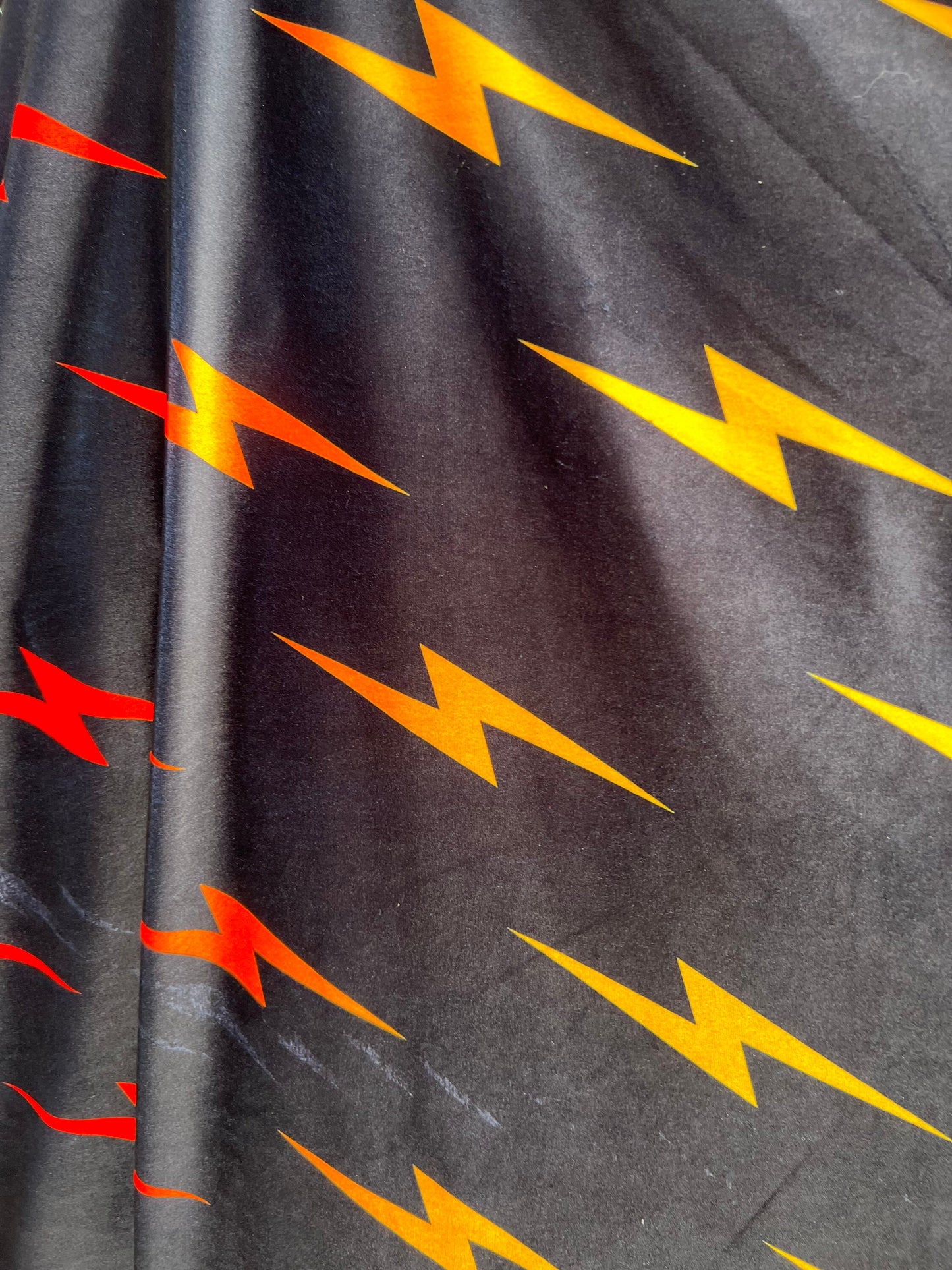 Flash design black/red/pink print on great quality of stretch velvet 4-way stretch 58/60” Sold by the YD. Ships Worldwide from Los Angeles