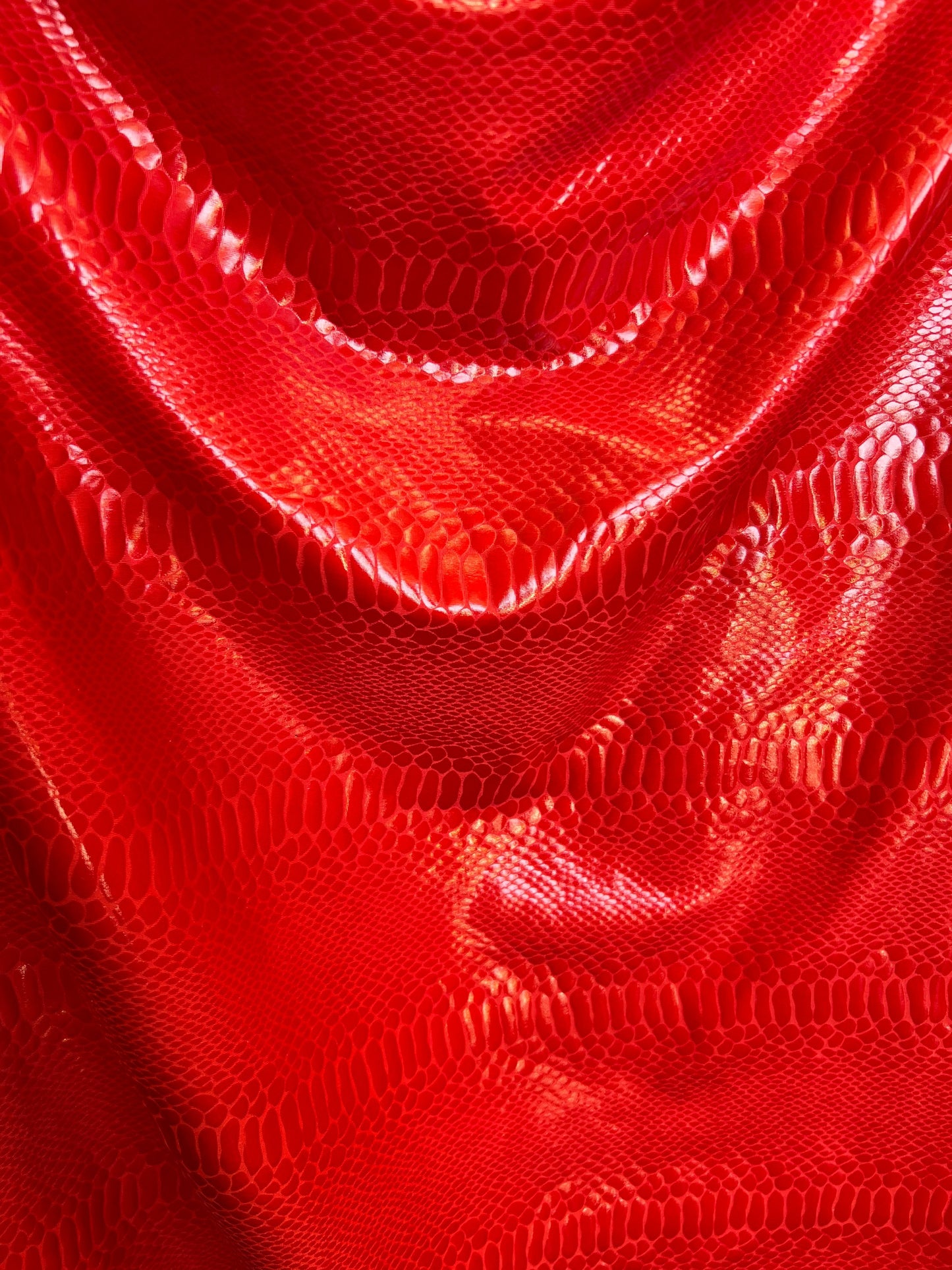 New Anaconda iridescent clear foil on poly spandex 2-way stretch medium weight 58/60” Sold by the YD. Ships Worldwide from Los Angeles Calif