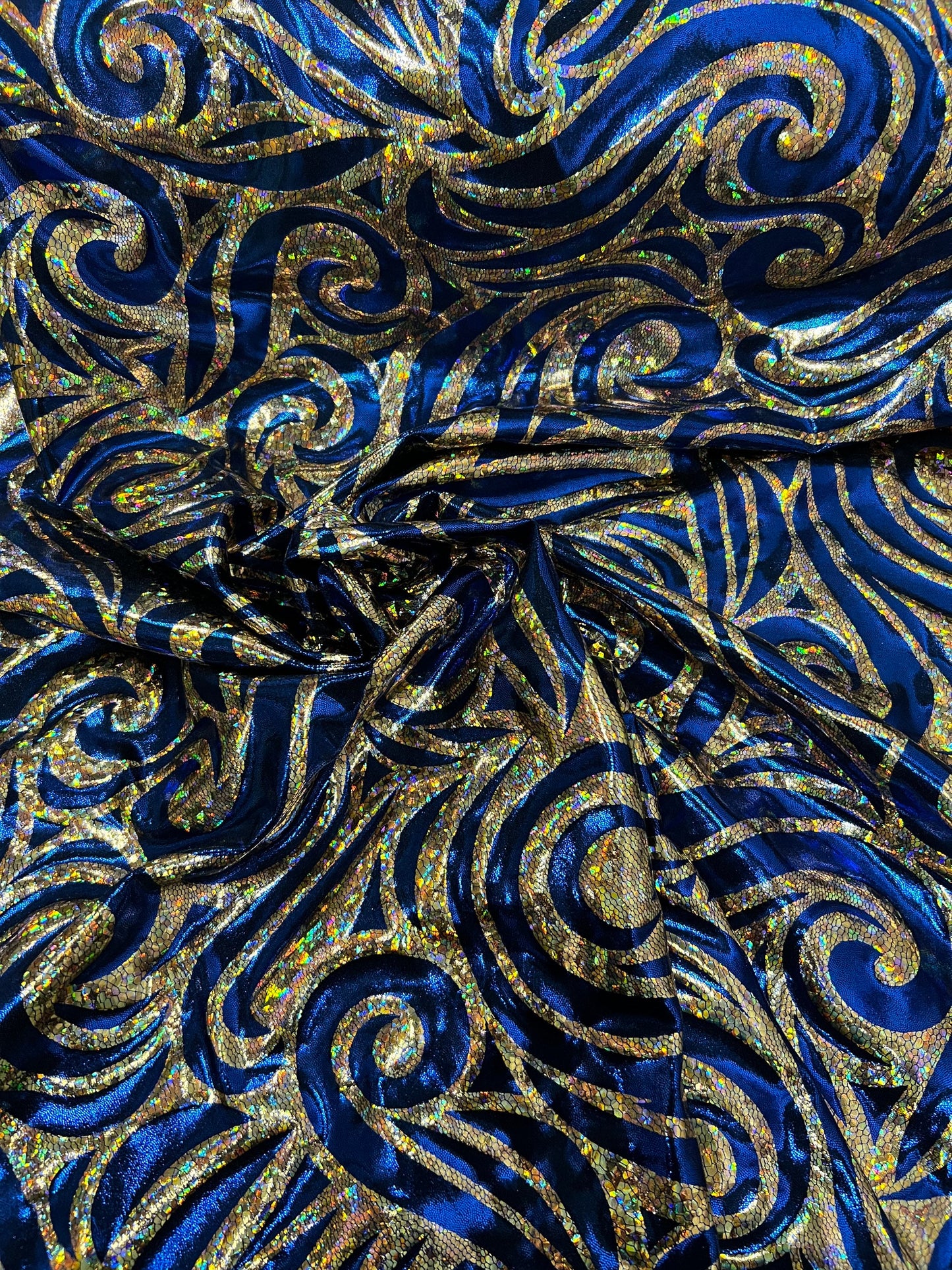 Rolex Luxury swirl design hologram metallic nylon spandex 4-way stretch Midnight Blue/Gold 58/60” Sold by the YD. Ships Worldwide from L.A