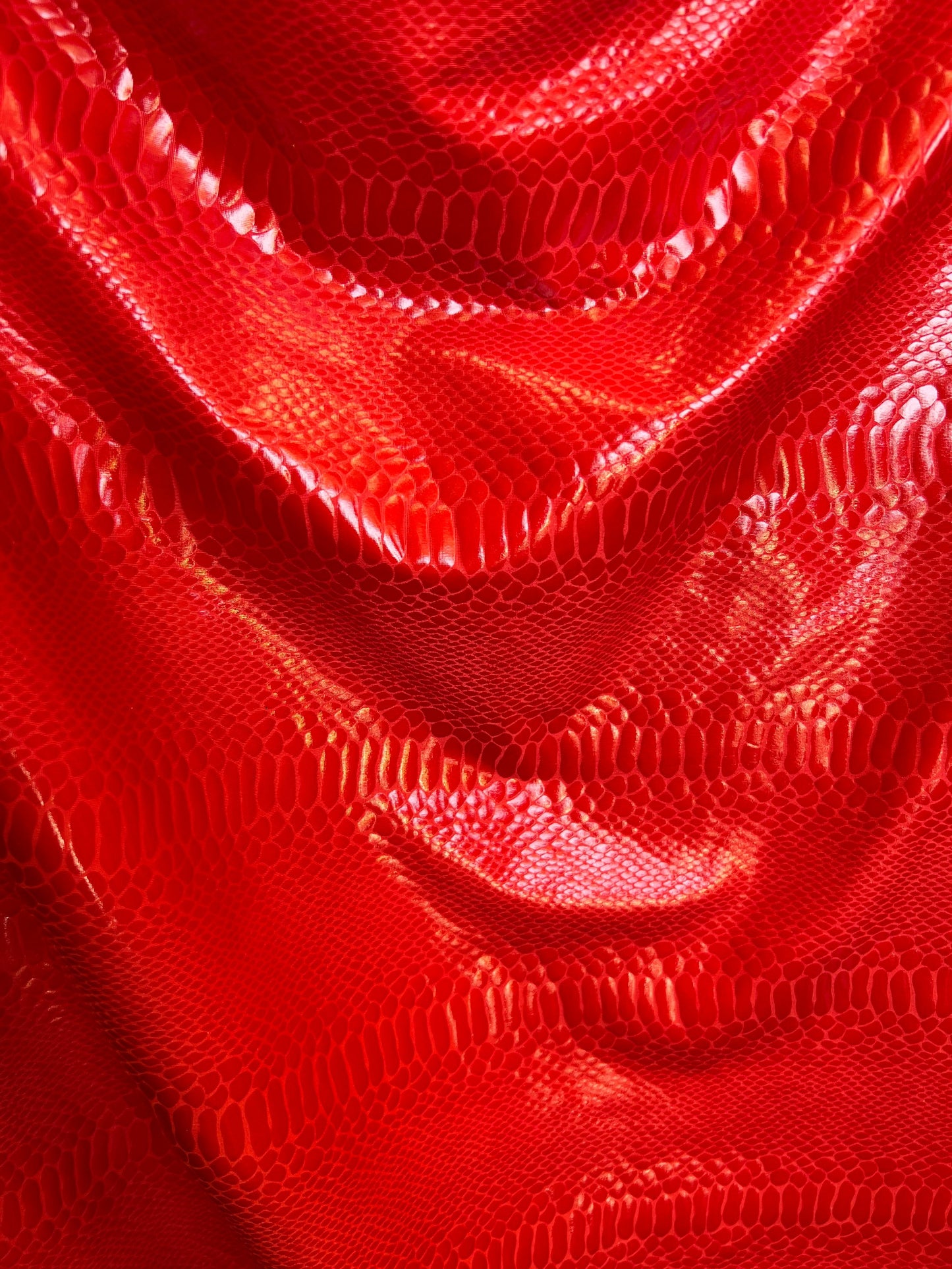 New Anaconda iridescent clear foil on poly spandex 2-way stretch medium weight 58/60” Sold by the YD. Ships Worldwide from Los Angeles Calif