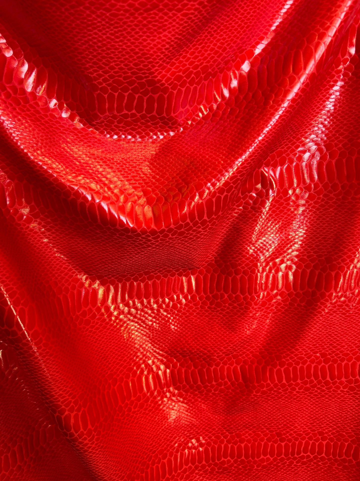 New Anaconda iridescent clear foil on poly spandex 2-way stretch medium weight 58/60” Sold by the YD. Ships Worldwide from Los Angeles Calif