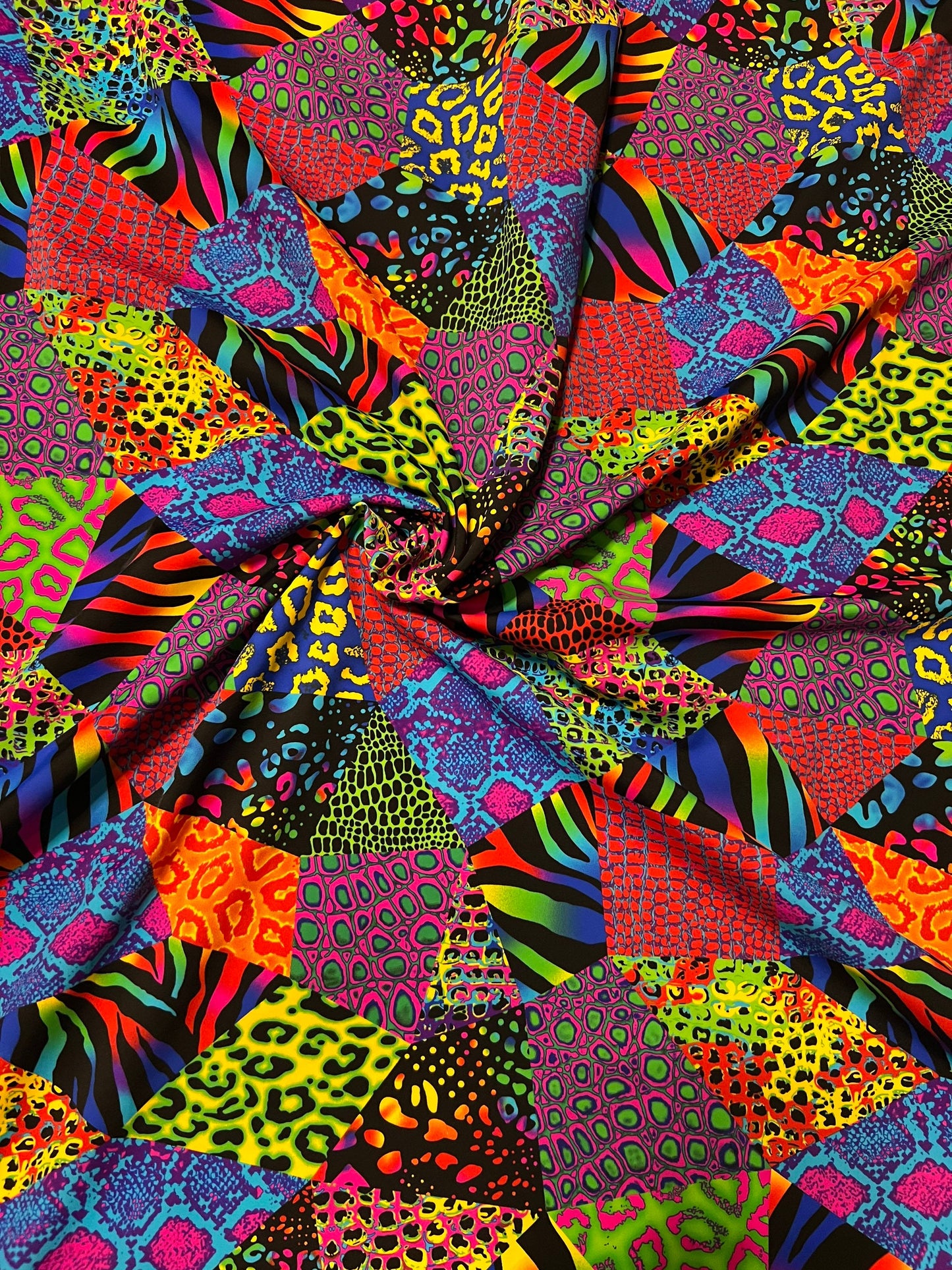 Nylon Spandex Multi Animal Print multicolor 4way stretch 58/60” Sold by the yd. Ships worldwide from Los Angeles California USA.
