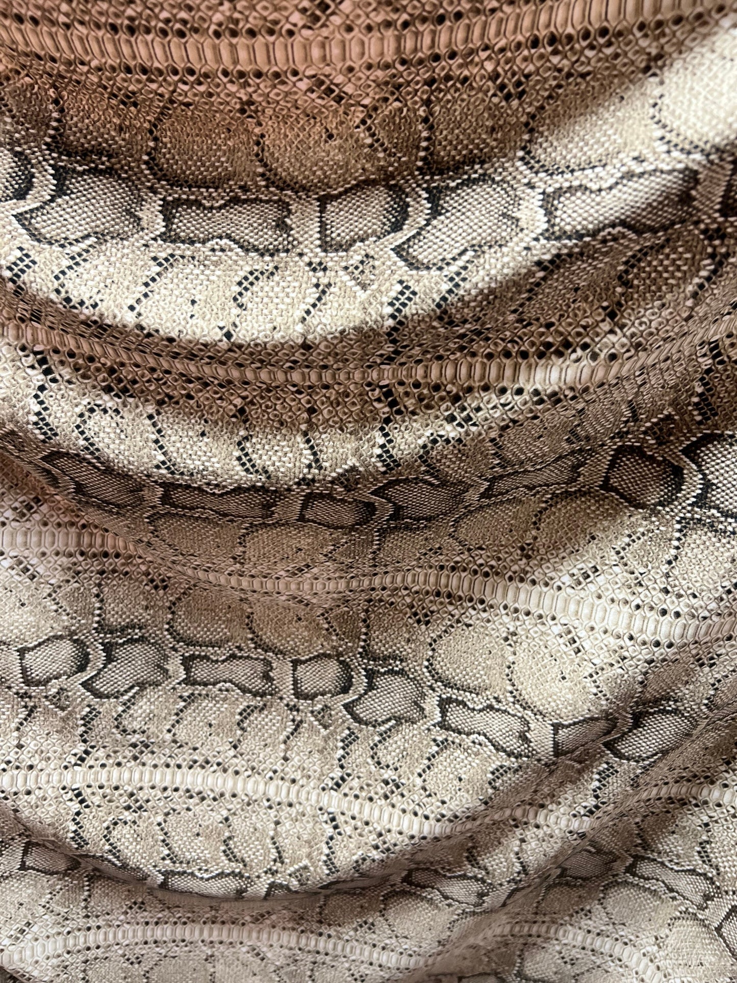 Exotic Snake skin design Natural/Brown print on poly spandex 4-way stretch 58/60” Sold by the YD. Ships Worldwide from Los Angeles CA