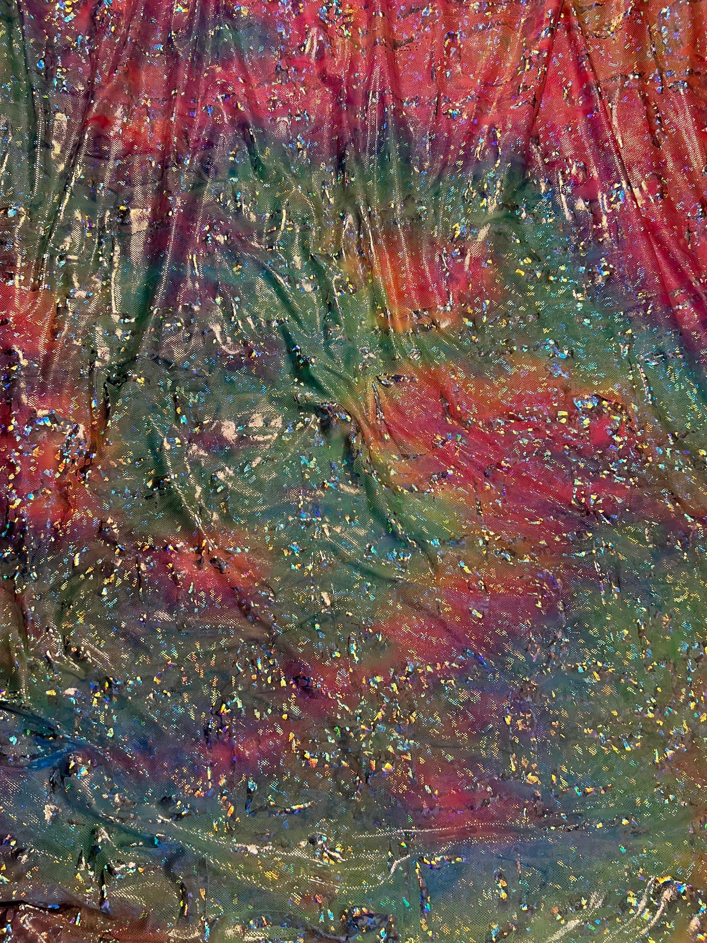 New abstract design hologram metallic poly spandex Rainbow multi pastel colors 2-way stretch 58/60” Sold by the YD.