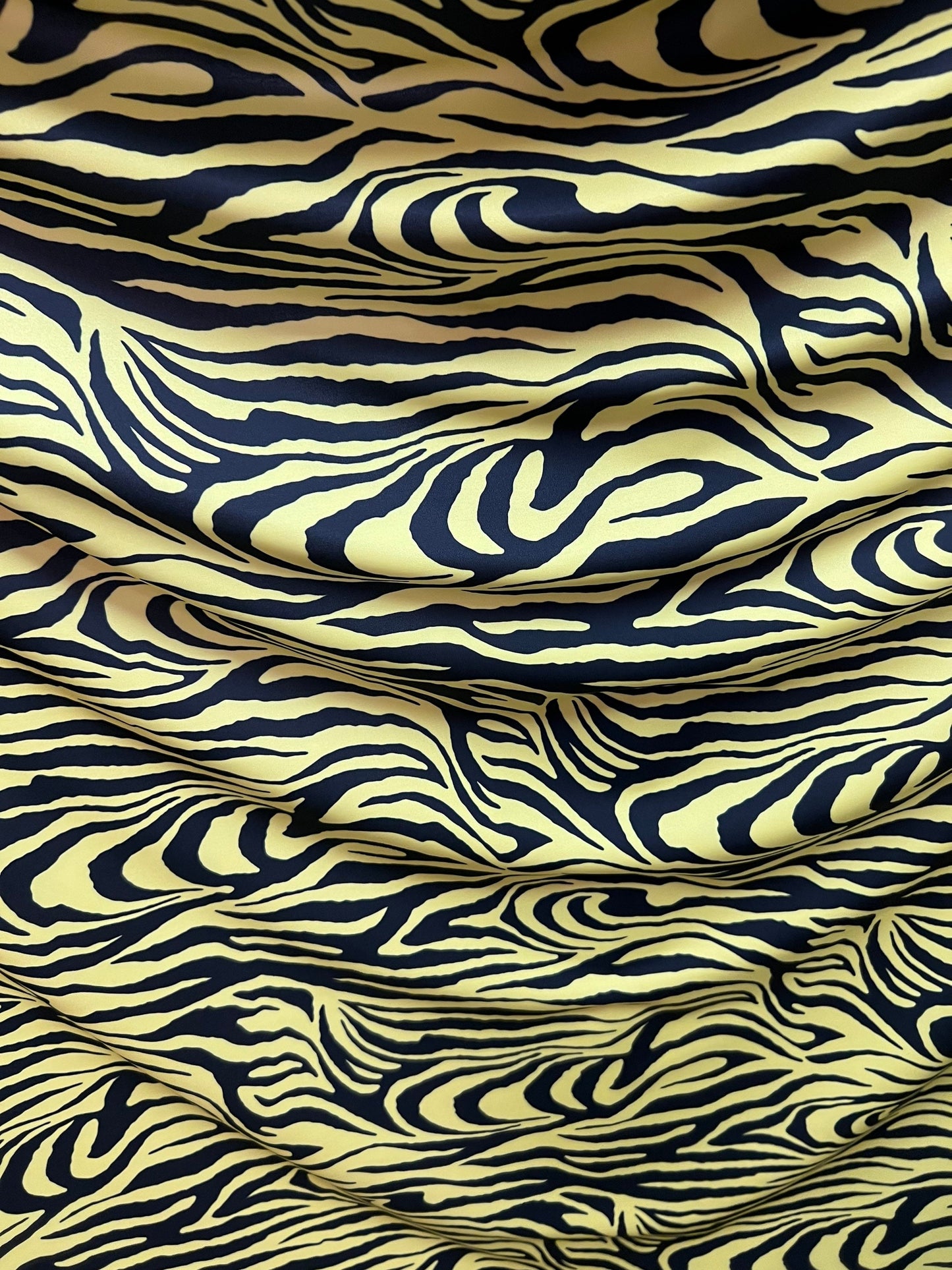 Exotic Zebra design yellow/black print on best quality of nylon spandex 4-way stretch 58/60” Sold by the YD. Ships Worldwide from Los CA