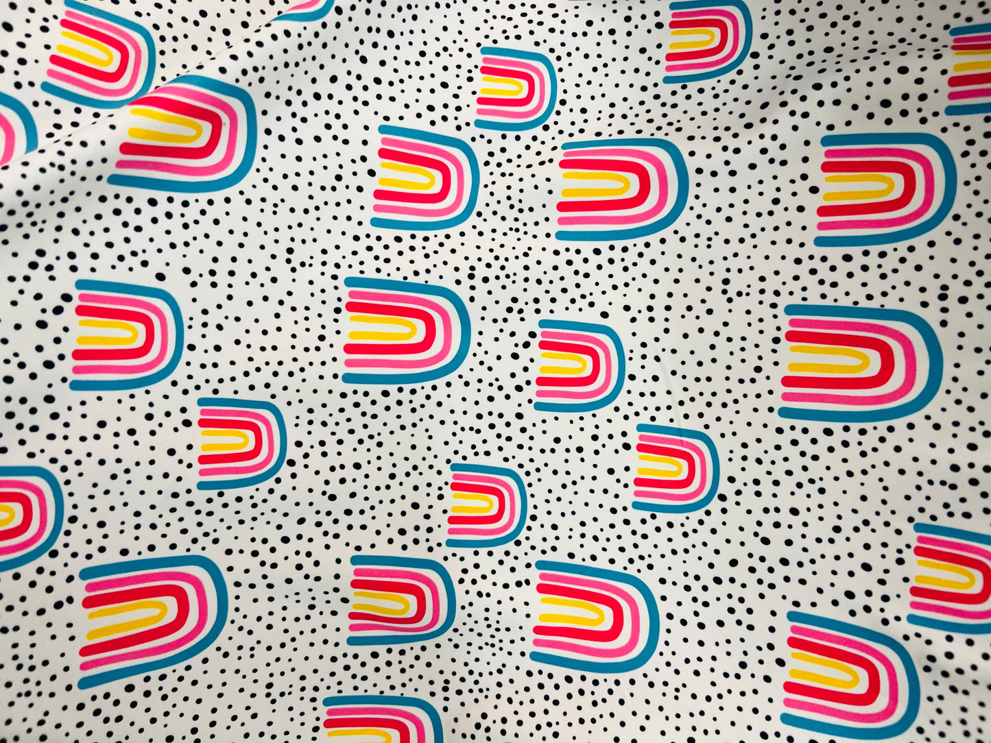 New abstract design white/rainbow print on great quality of Nylon Spandex 4-way stretch 58/60” Sold by the YD. Ships Worldwide from L.A