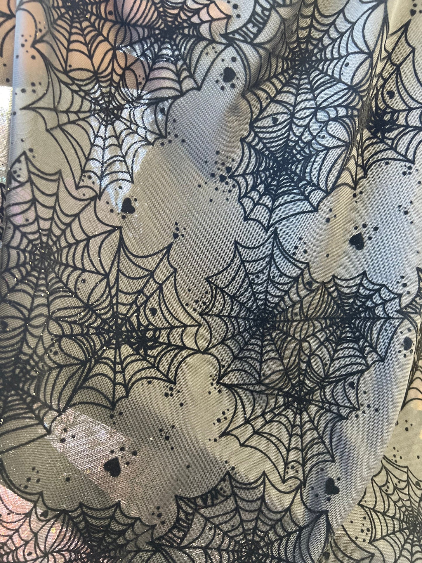 New Spider web design print on great quality of power mesh nylon spandex 4-way stretch 58/60” Sold by the YD. Ships Worldwide from Los CA