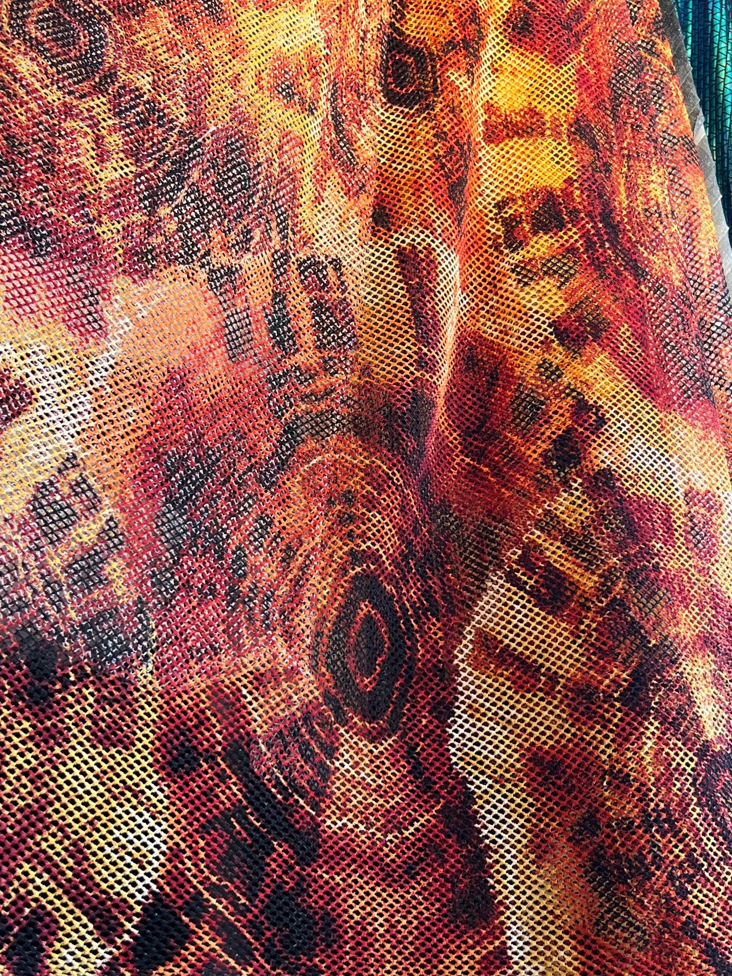 Abstract design Burn Orange print on fishnet 2-way stretch 58/60” Sold by the YD. Ships Worldwide from Los Angeles California USA