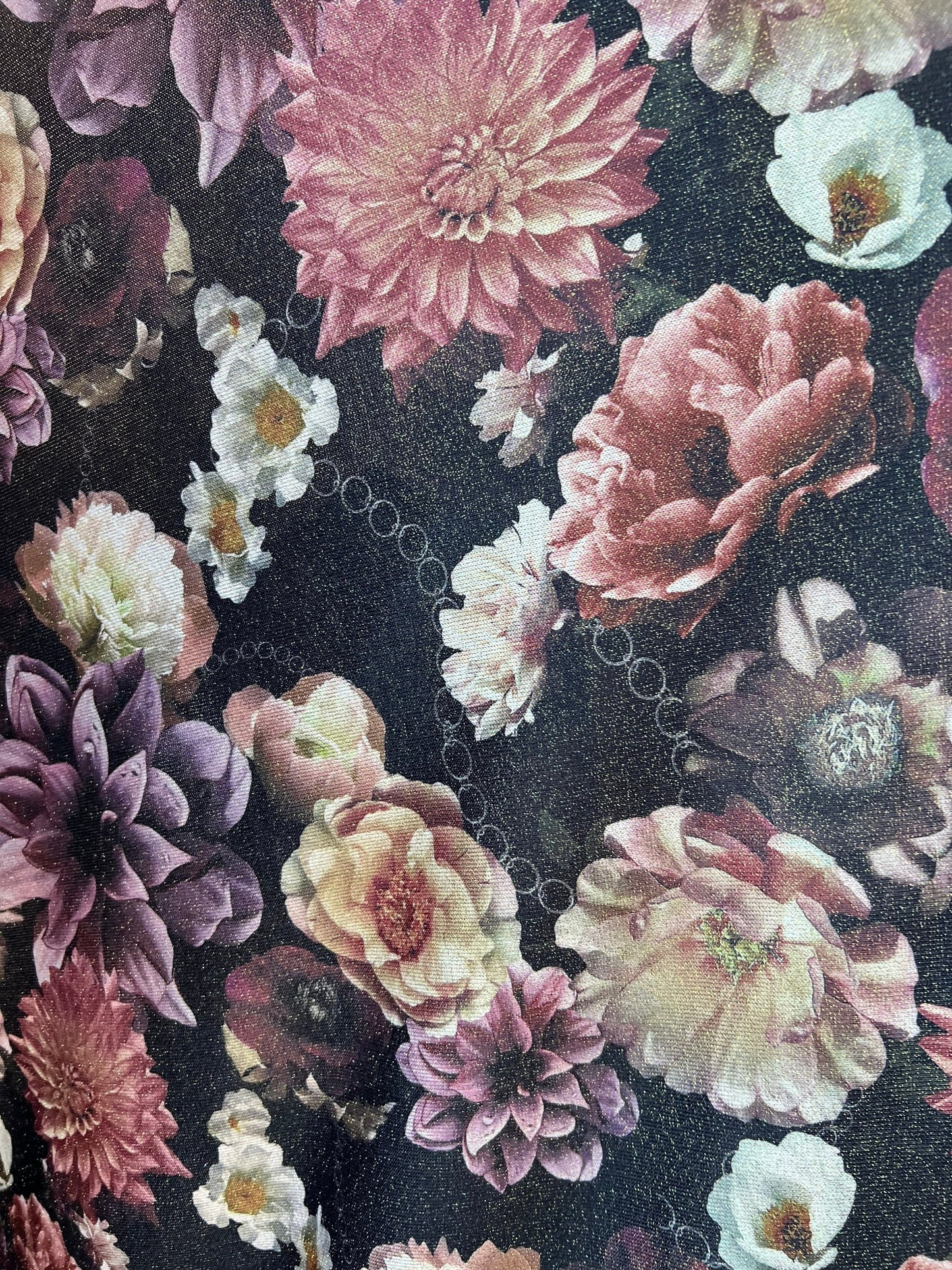 Romantic floral design print on metallic poly spandex 2-way stretch 58/60” Sold by the YD. Ships worldwide from Los Angeles California USA