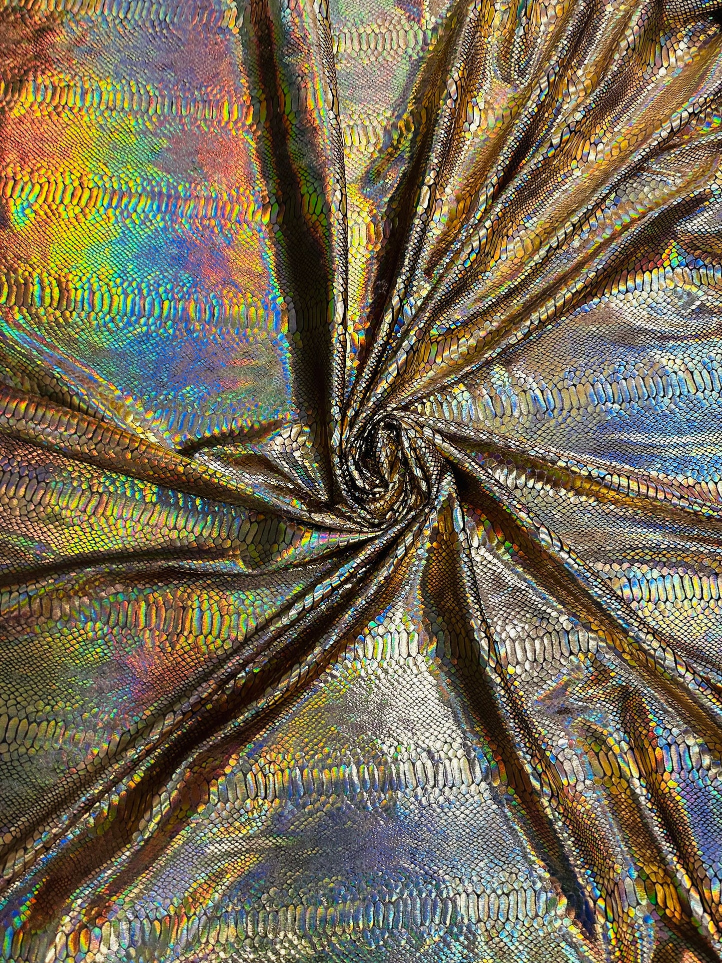 Cobra design great quality of stretch velvet with foil Iridescent bronze 4-way stretch 58/60” Sold by the YD. Ships worldwide from L.A CA