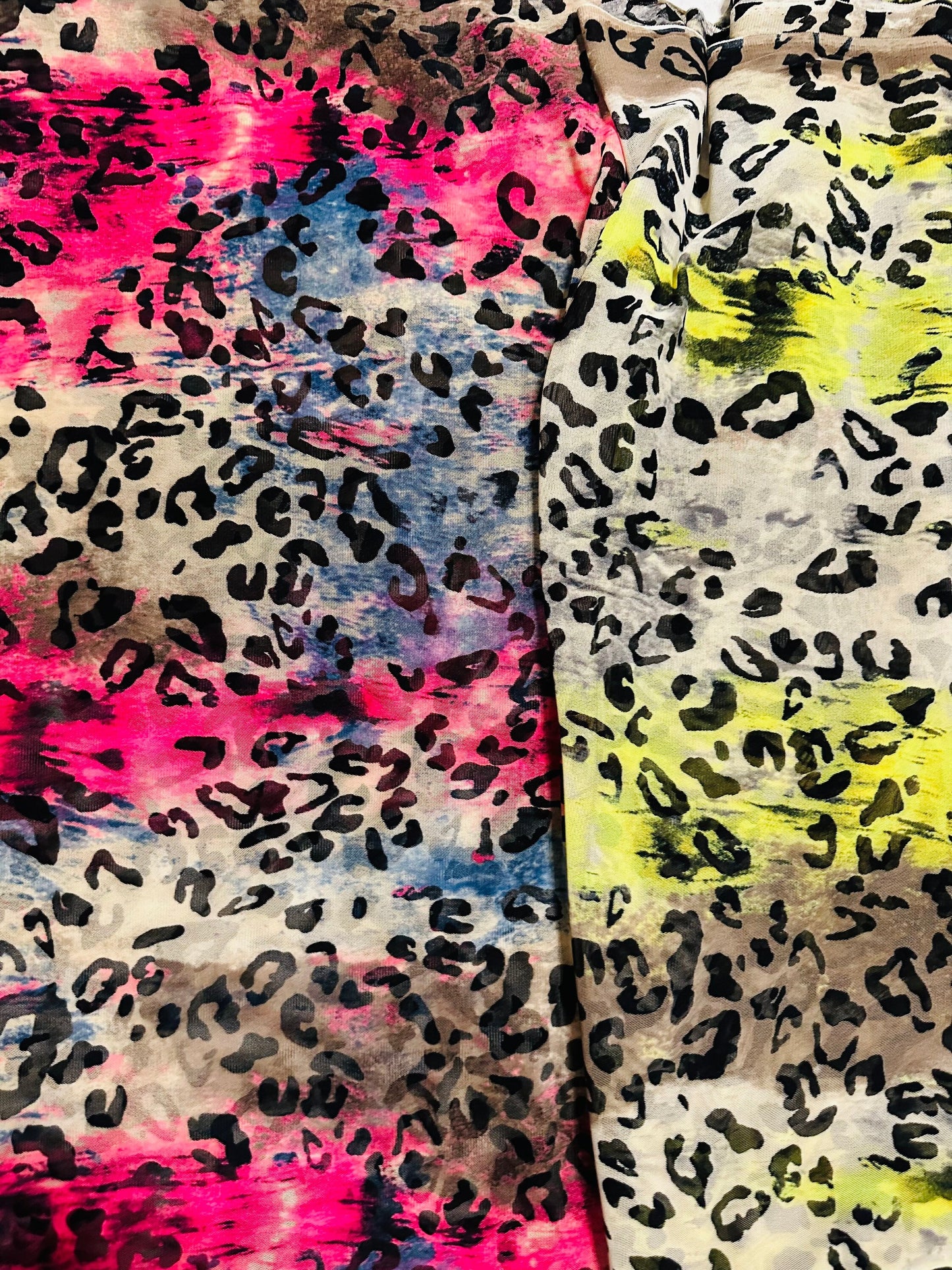 New exotic leopard design it glows in the dark with a black light print on great quality of power mesh spandex 4-way stretch 58/60”