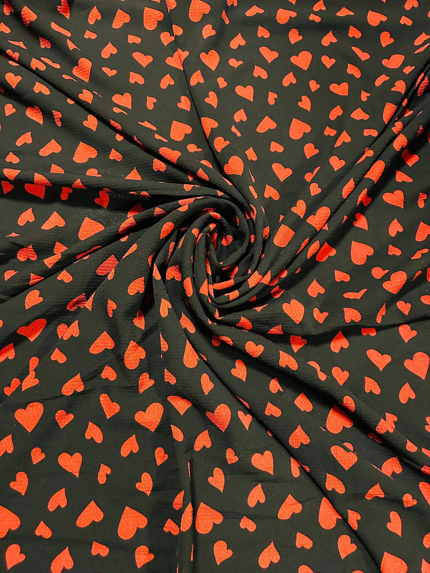 New Romantic Heart design Black/Red print on Polyester crepe spandex one way stretch light fabric 58/60” Sold by the YD.