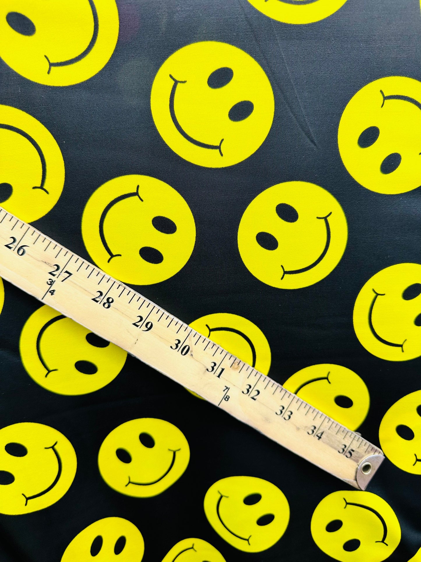 Happy Face Emoji design print on best quality of nylon spandex 4-way stretch 58/60” Sold by the YD. Ships worldwide from L.A