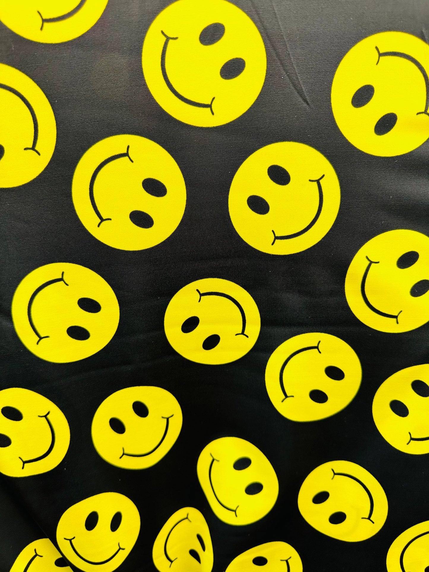 Happy Face Emoji design print on best quality of nylon spandex 4-way stretch 58/60” Sold by the YD. Ships worldwide from L.A
