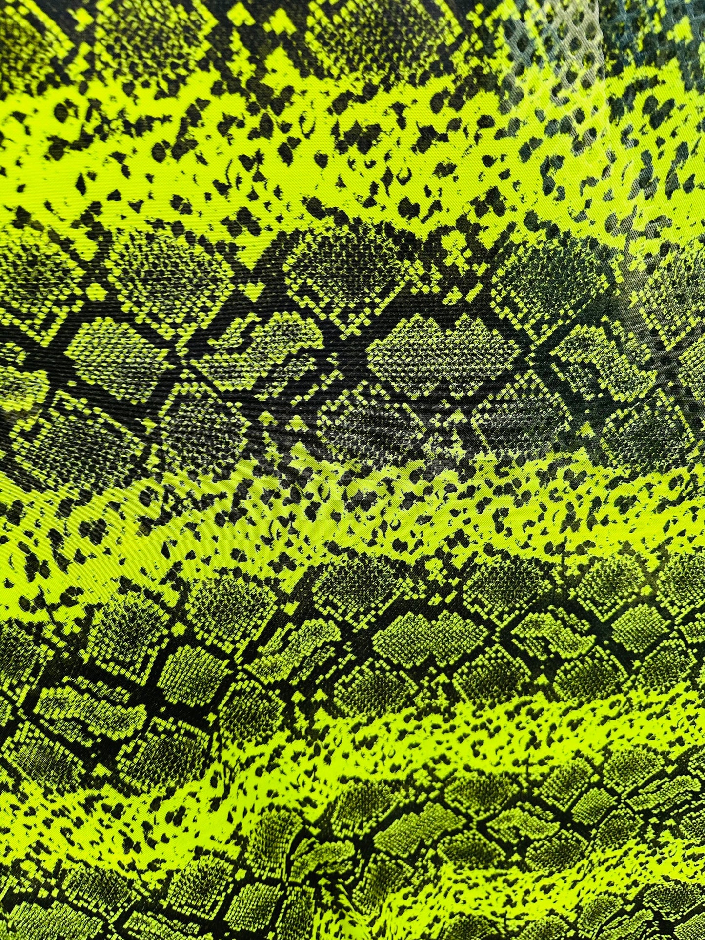 Exotic Boa snake design print on great quality of power mesh 4-way stretch 58/60” Sold by the YD. Ships worldwide from L.A