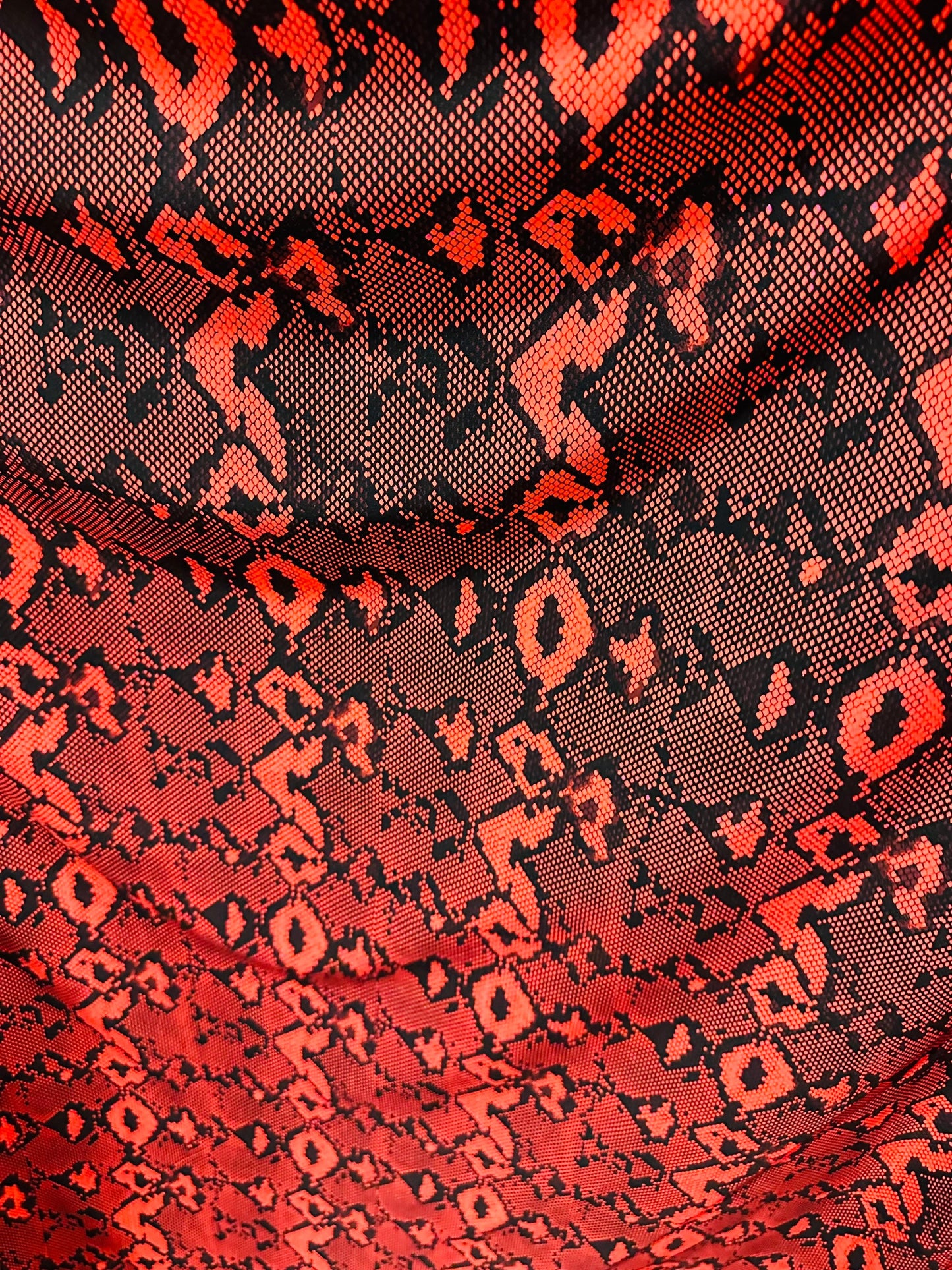 Red snake design print on great quality of nylon spandex;-way stretch 58/60” Sold by the YD Sold by the YD. Ships worldwide from Los Angeles