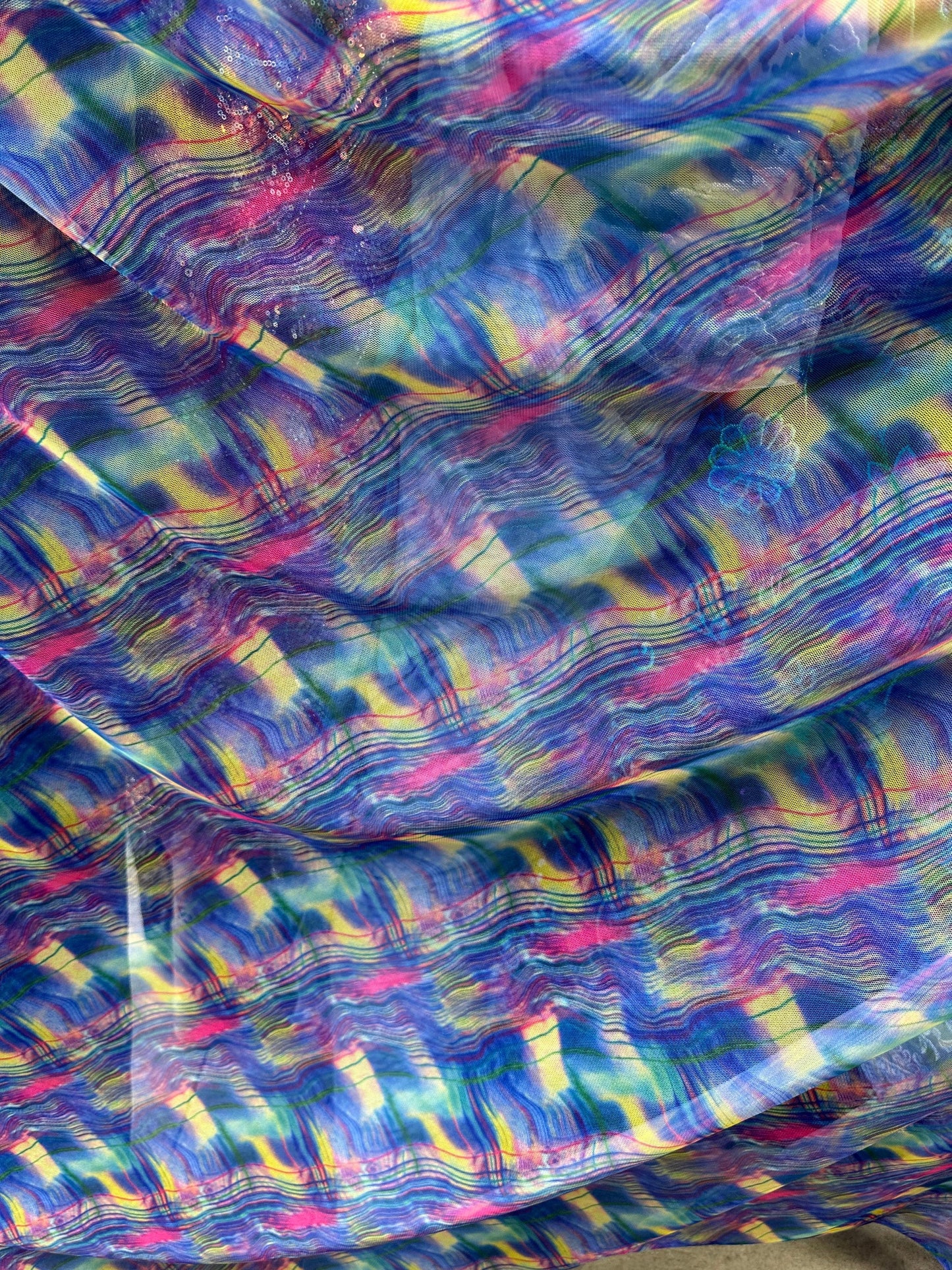 New abstract design blue multi print on power mesh 4-way stretch 58/60” Sold by the YD. Ships worldwide from Los Angeles California USA
