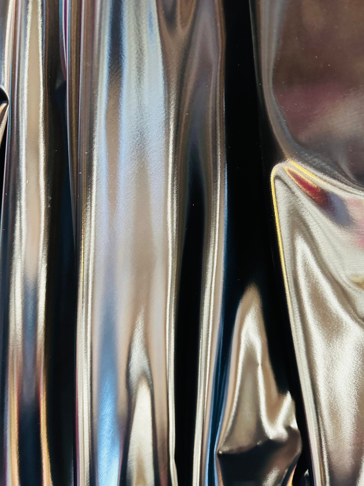 Luxury super shiny reflective black stretch vinyl high quality of latex 4-way stretch 58/60” Sold by the YD. Ships worldwide from L.A CA