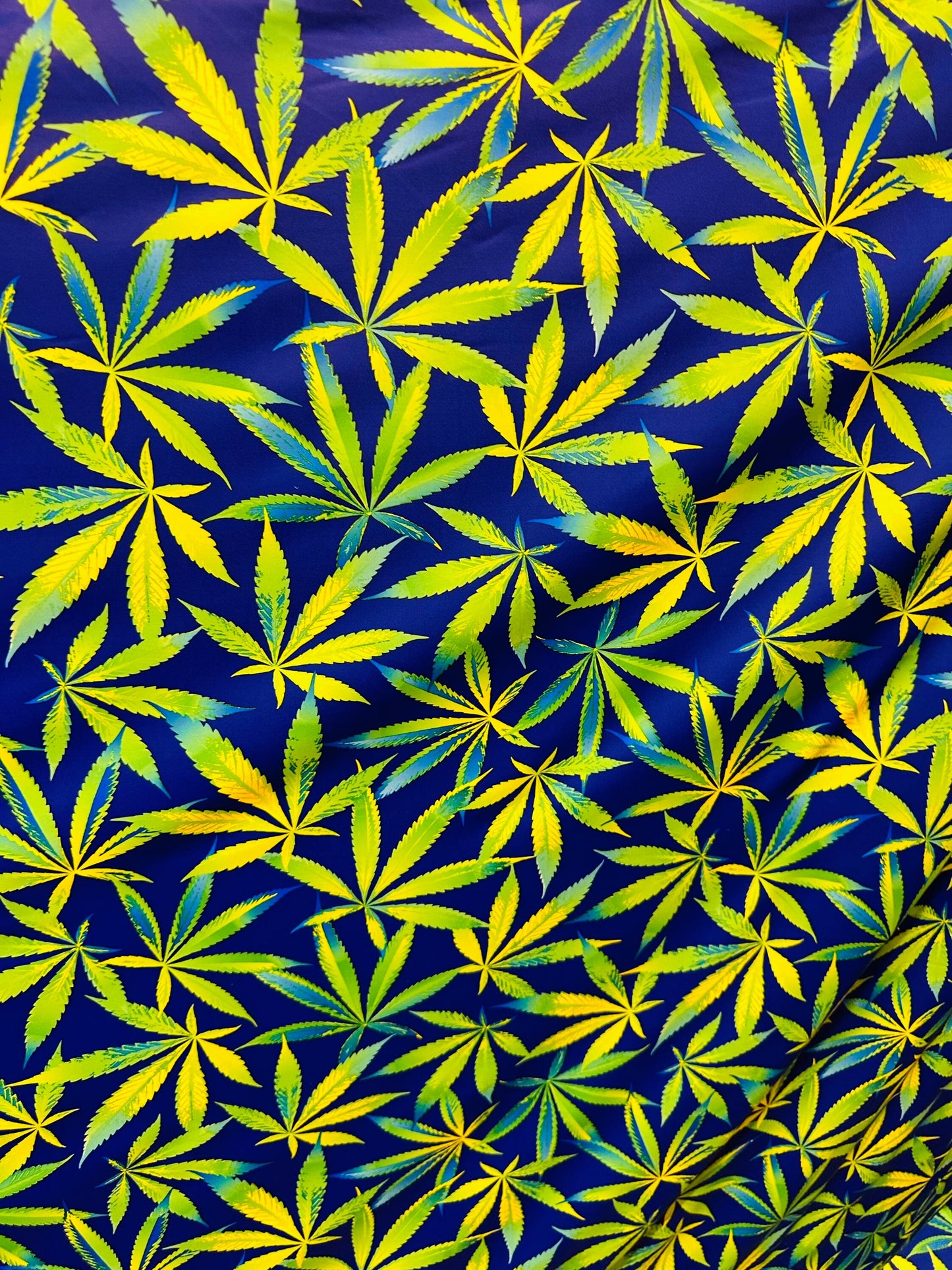 Marihuana leaf design multicolor print on best quality of nylon spandex 4-way stretch 58/60” Sold by the YD. Ships worldwide from L.A