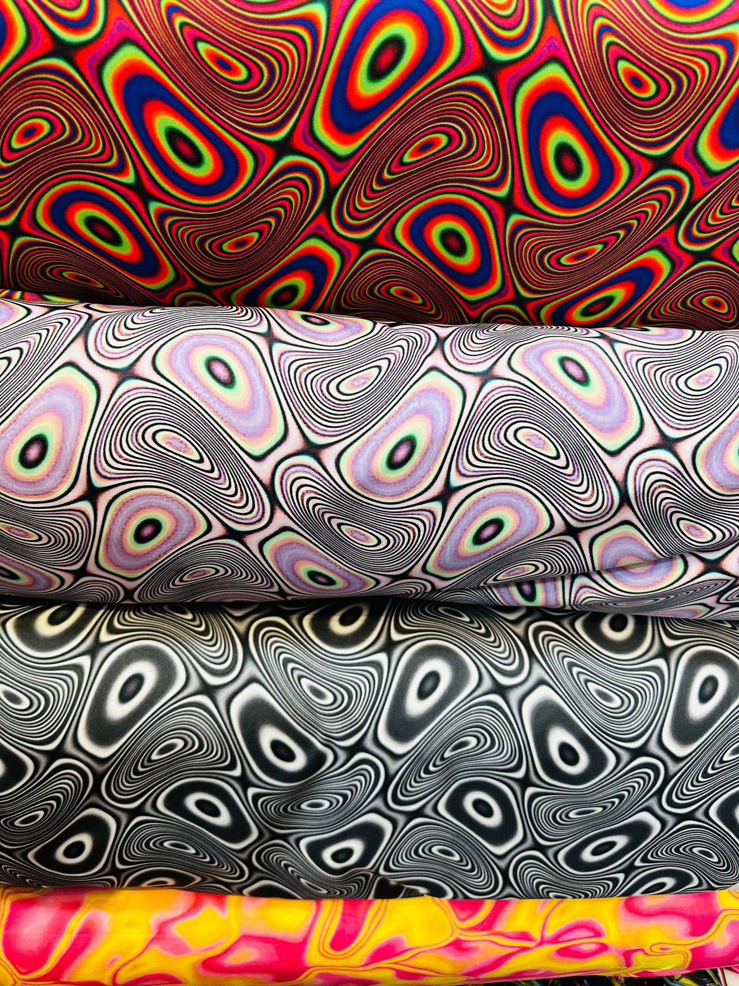 Modern Psychedelic lava design print on great quality of nylon spandex;-way stretch 58/60” Sold by the YD. Ships worldwide from L.A