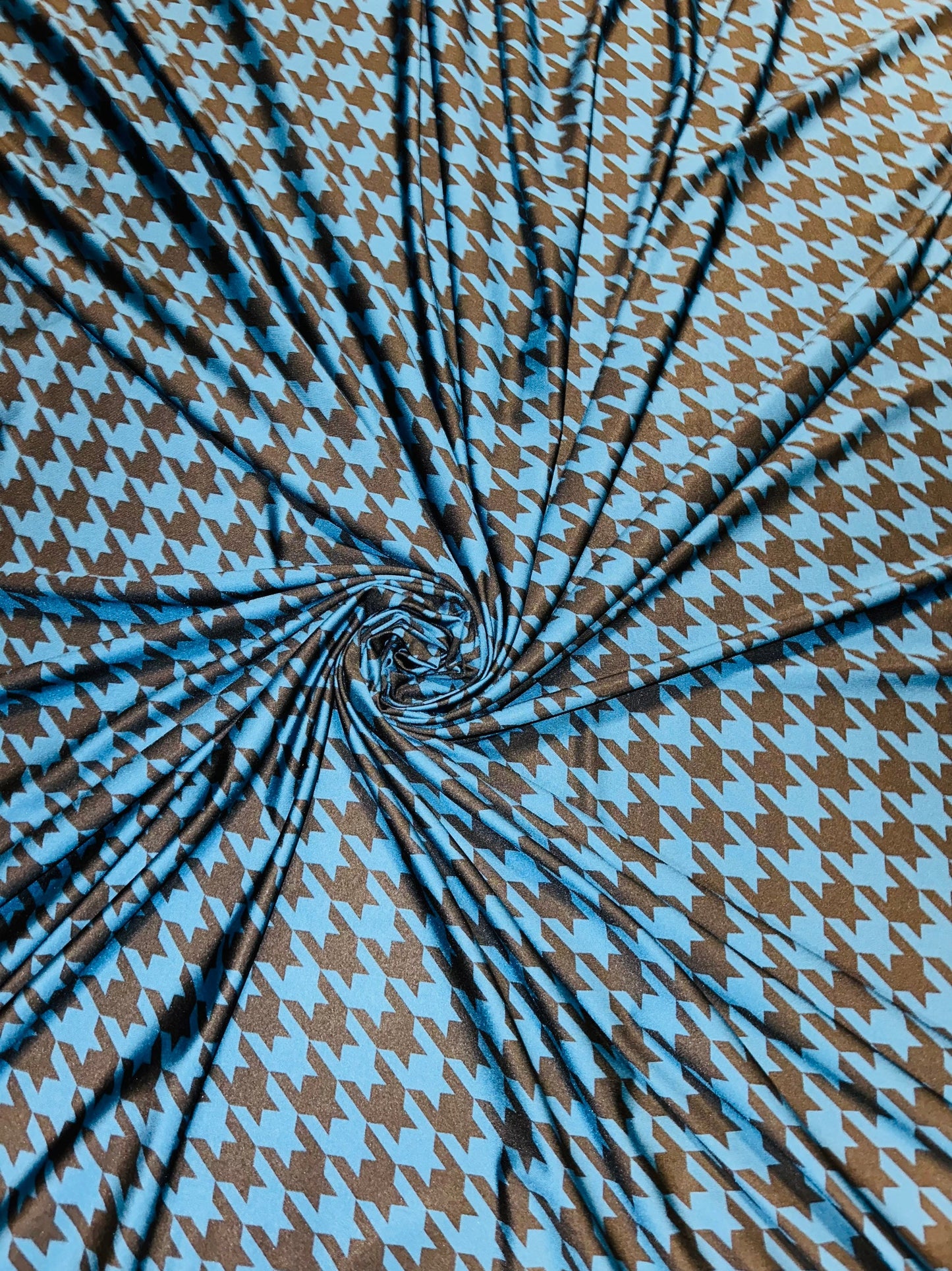 Houndstooth design print on great quality of nylon spandex 4-way stretch 58/60” Sold by the YD. Ships worldwide from L.A