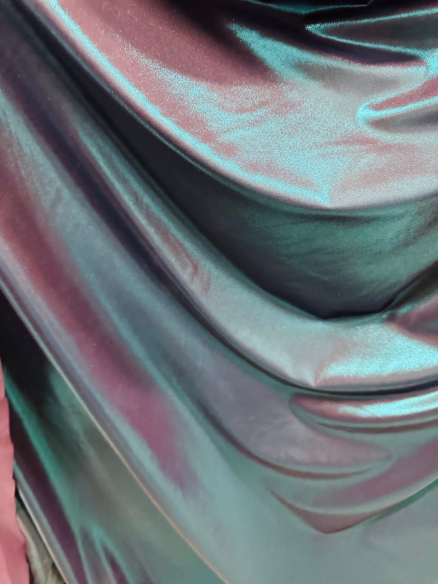 Metallic nylon spandex with foggy foil Navy/Teal iridescent foil 4-way stretch 58/60” Sold by the YD. Ships worldwide