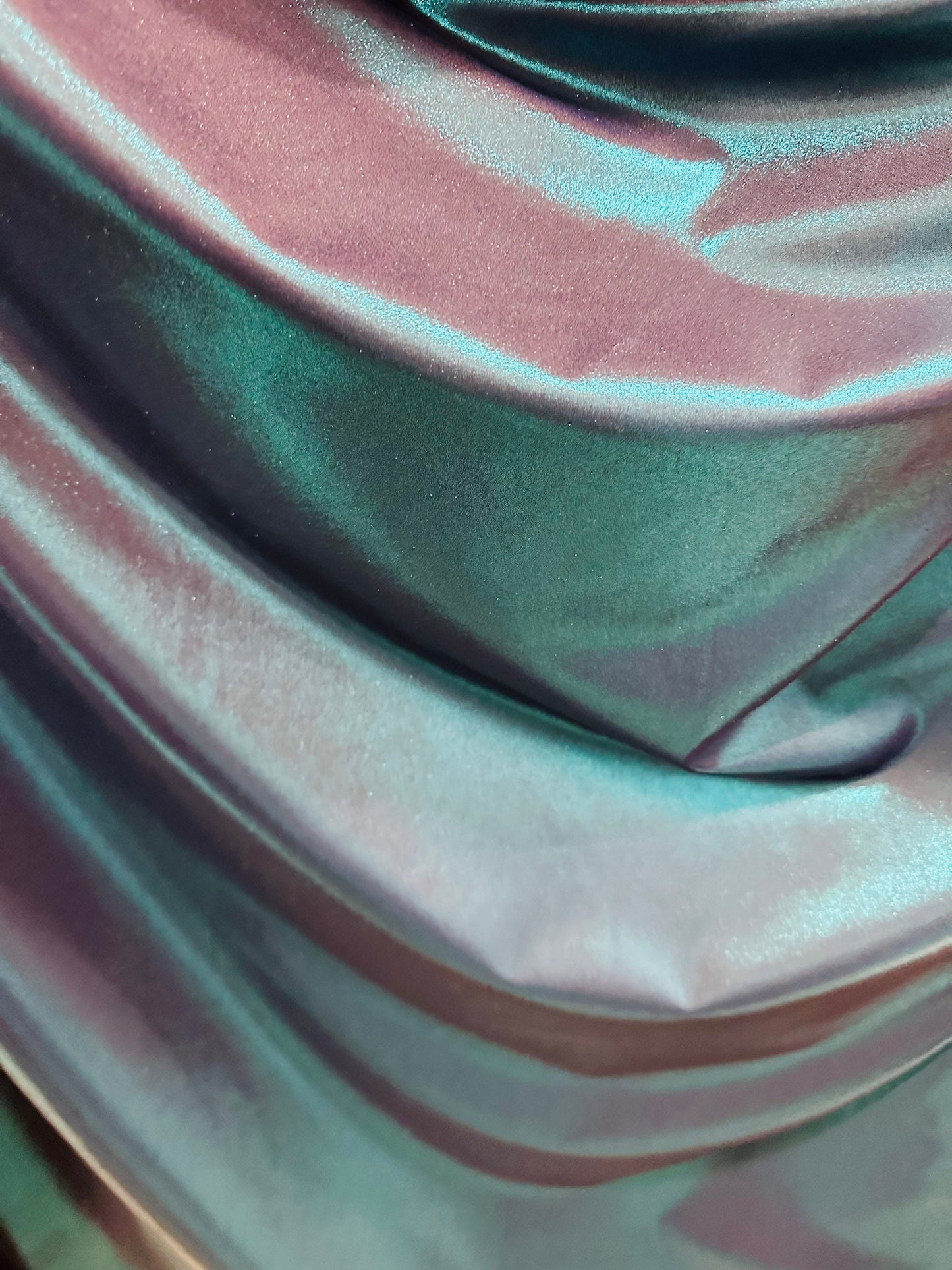Metallic nylon spandex with foggy foil Navy/Teal iridescent foil 4-way stretch 58/60” Sold by the YD. Ships worldwide