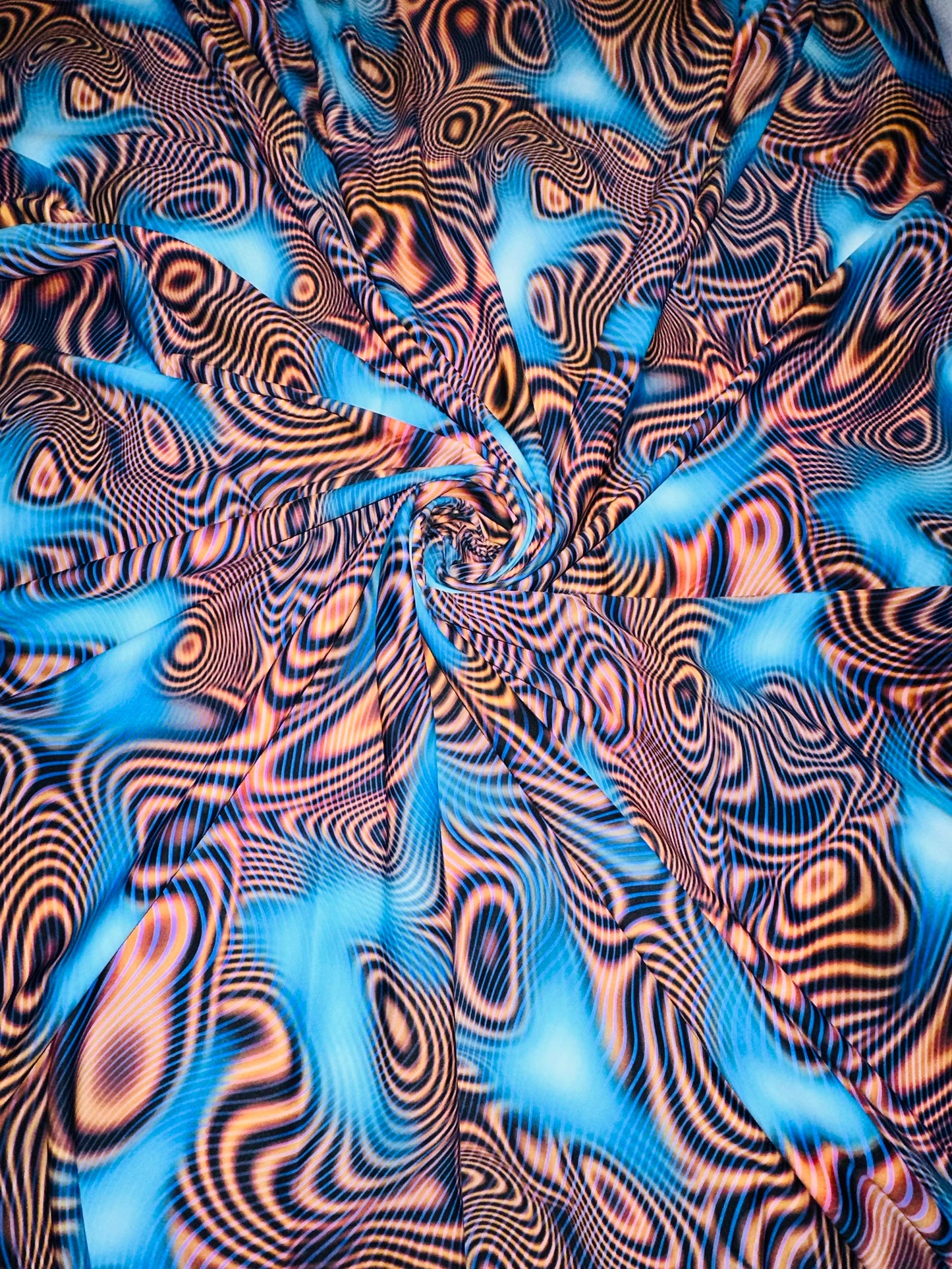 New psychedelic abstract design high quality of Nylon spandex fabric 4way Stretch. Fabric sold by the yard 58/60” ships worldwide from LA