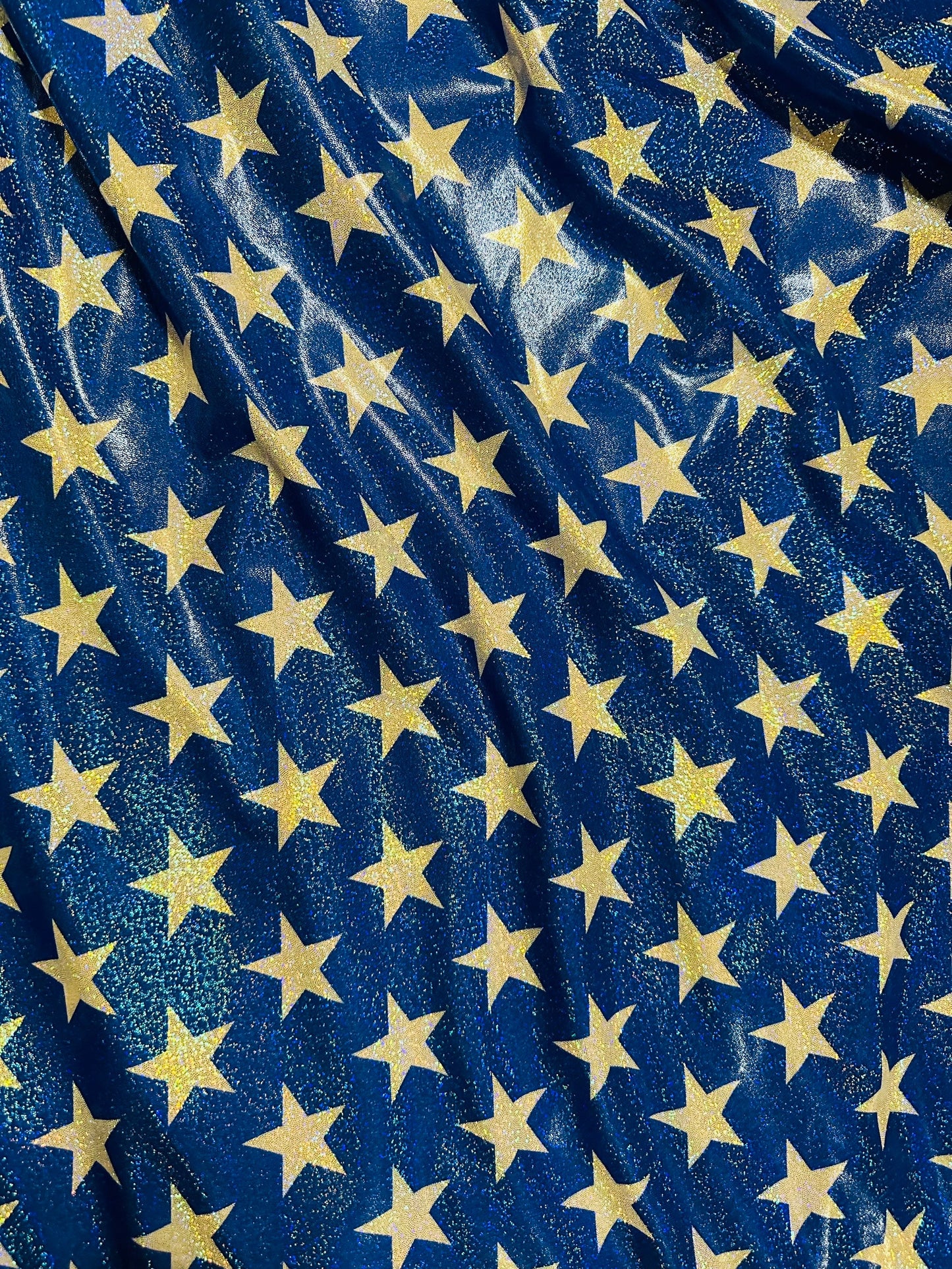Stars freedom design hologram metallic nylon spandex 4-way stretch 58/60” Sold by the YD. Ships worldwide from Los Angeles California USA