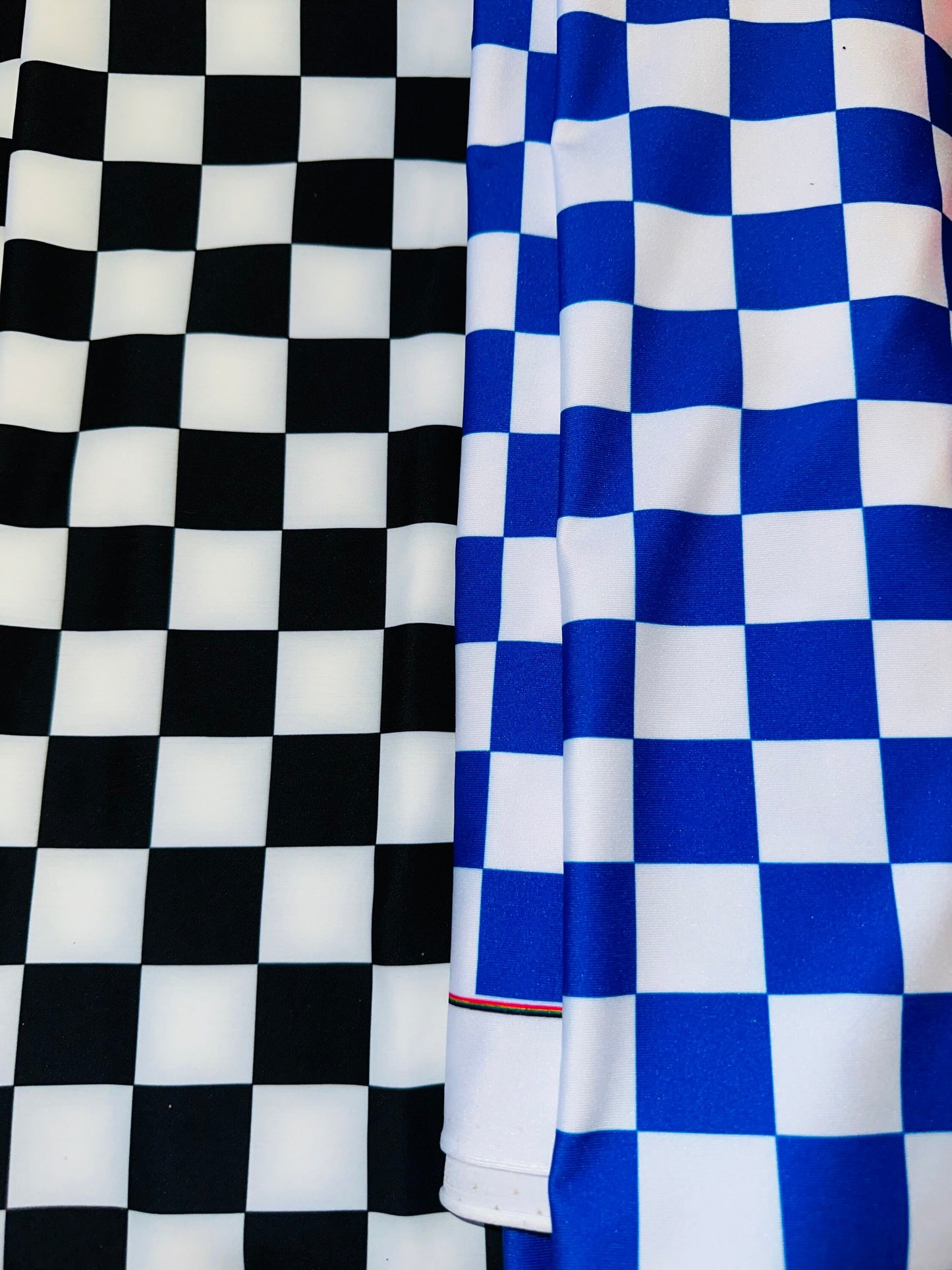 Deluxe checkers design print on great quality of nylon spandex 4-way stretch 58/60” Sold by the YD. Ships worldwide from L.A
