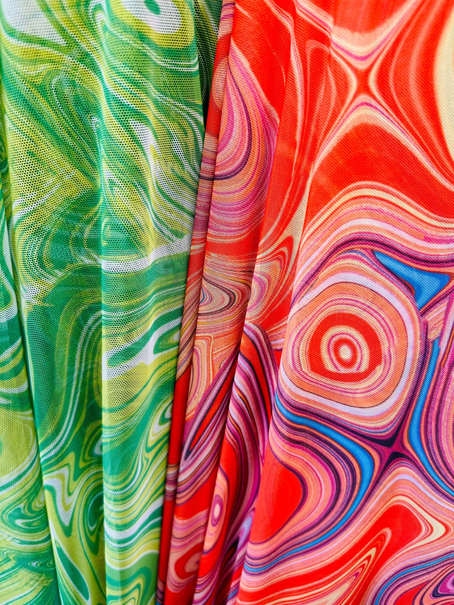 Lava abstract design print on great quality of nylon power mesh 4-way stretch 58/69” Sold by the YD.