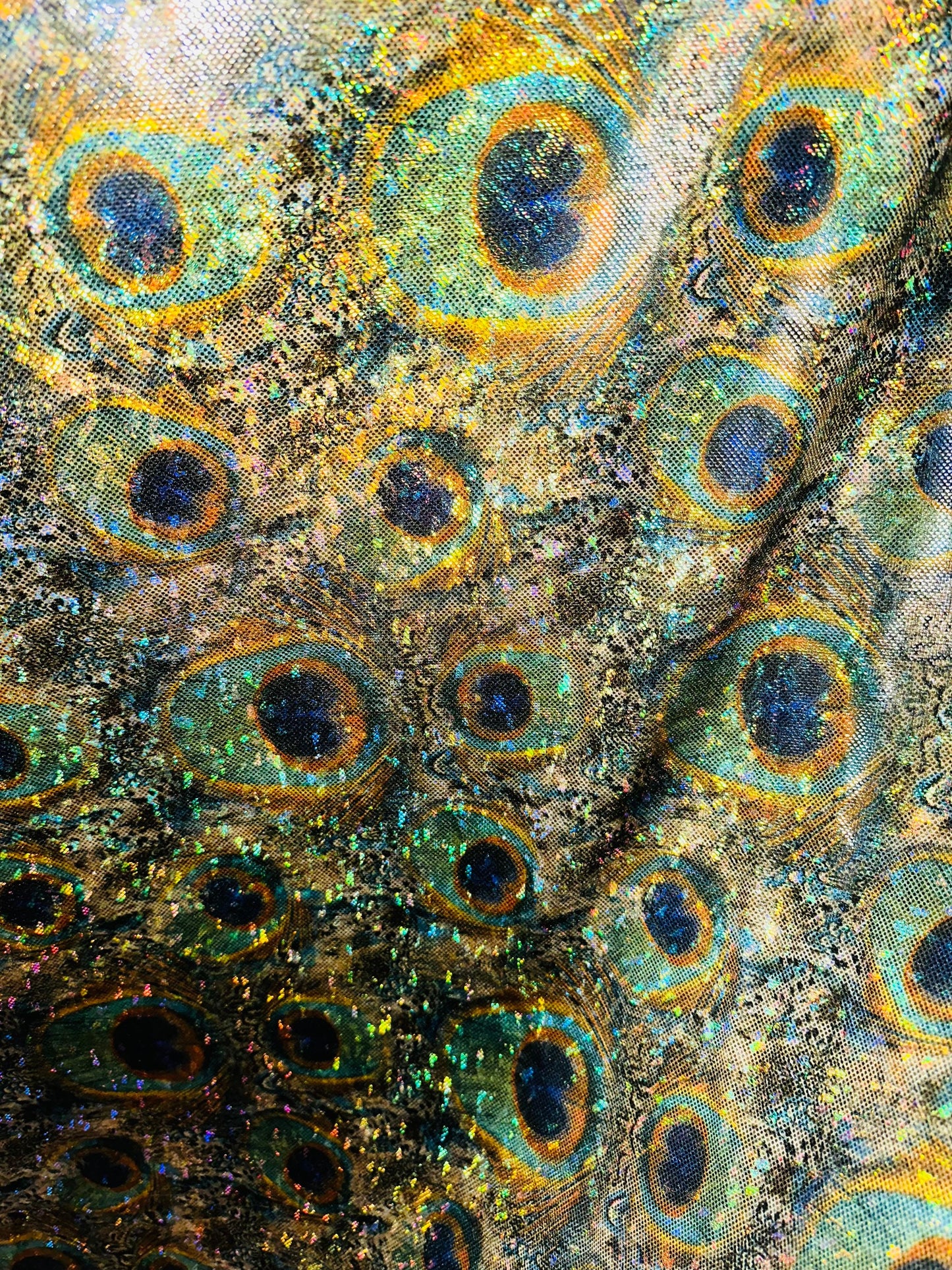 Luxury Peacock design on hologram shattered glass metallic nylon spandex 4-way stretch 58-60” Sold by the YD.