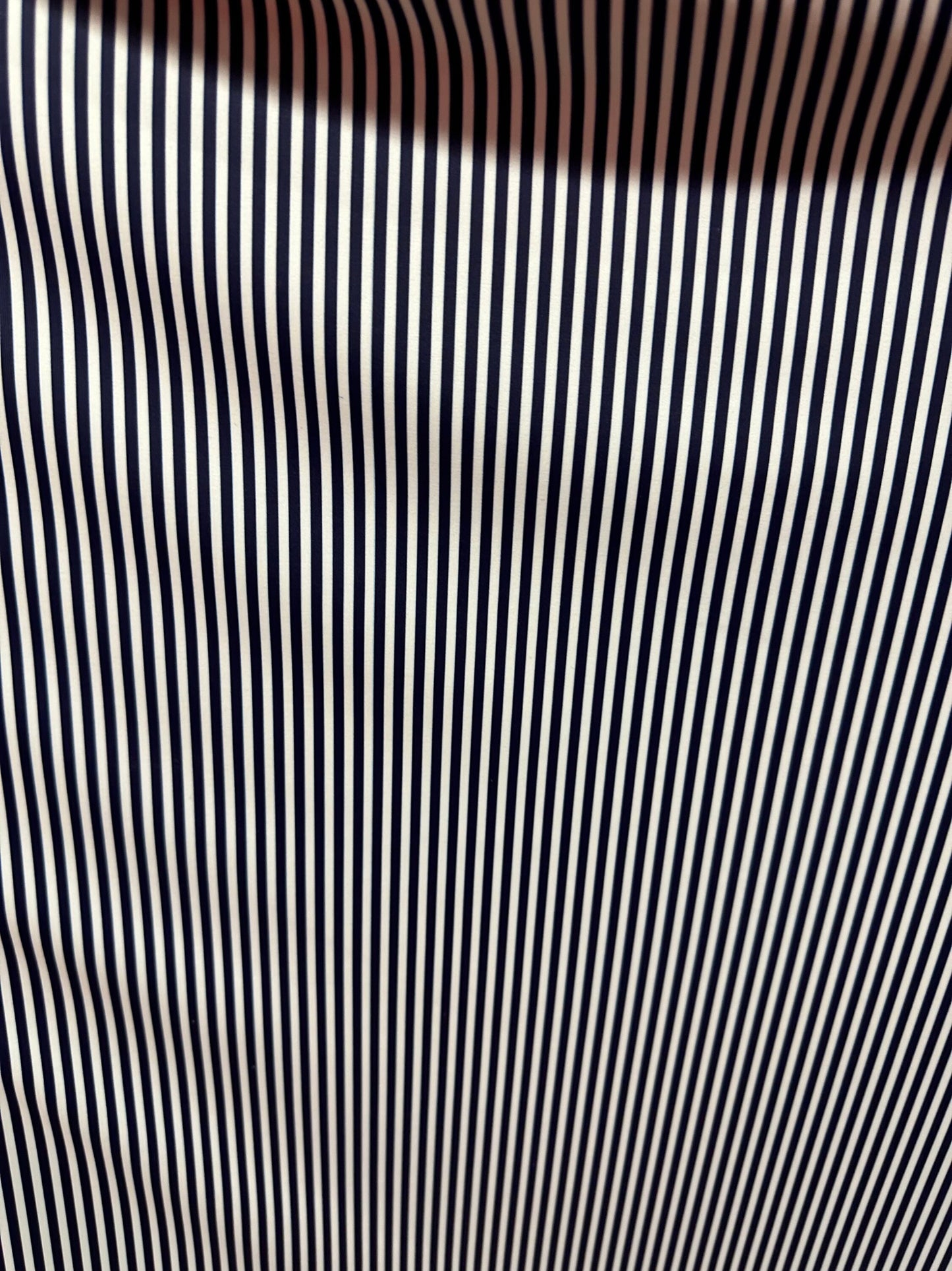 Small striped print nylon spandex best quality white/black 4-way stretch 58/60” Sold by the YD.