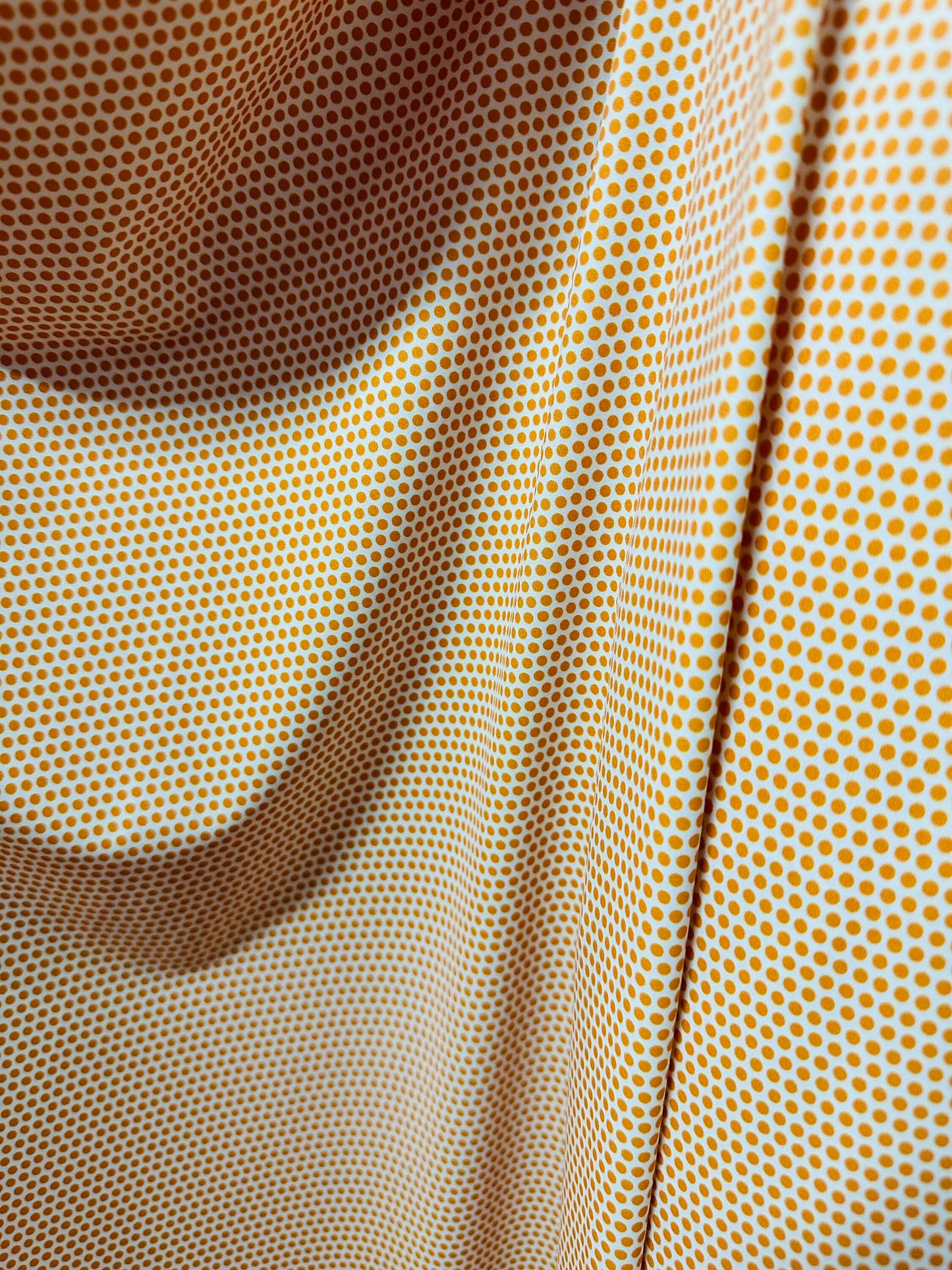 Polka dots design print on best quality of nylon spandex 4-way stretch 58/60”