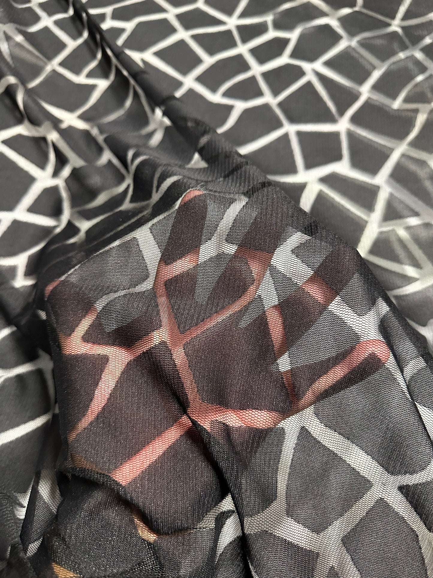 Giraffe exotic design on burnout power mesh 4-way stretch 58/60”
