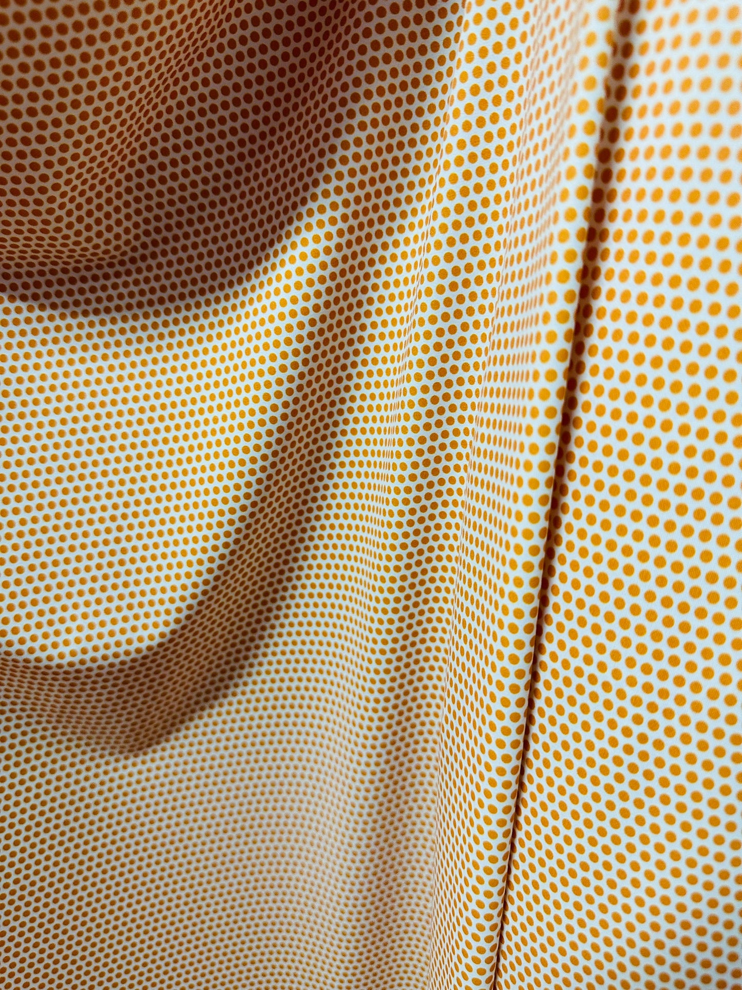 Polka dots design print on best quality of nylon spandex 4-way stretch 58/60”