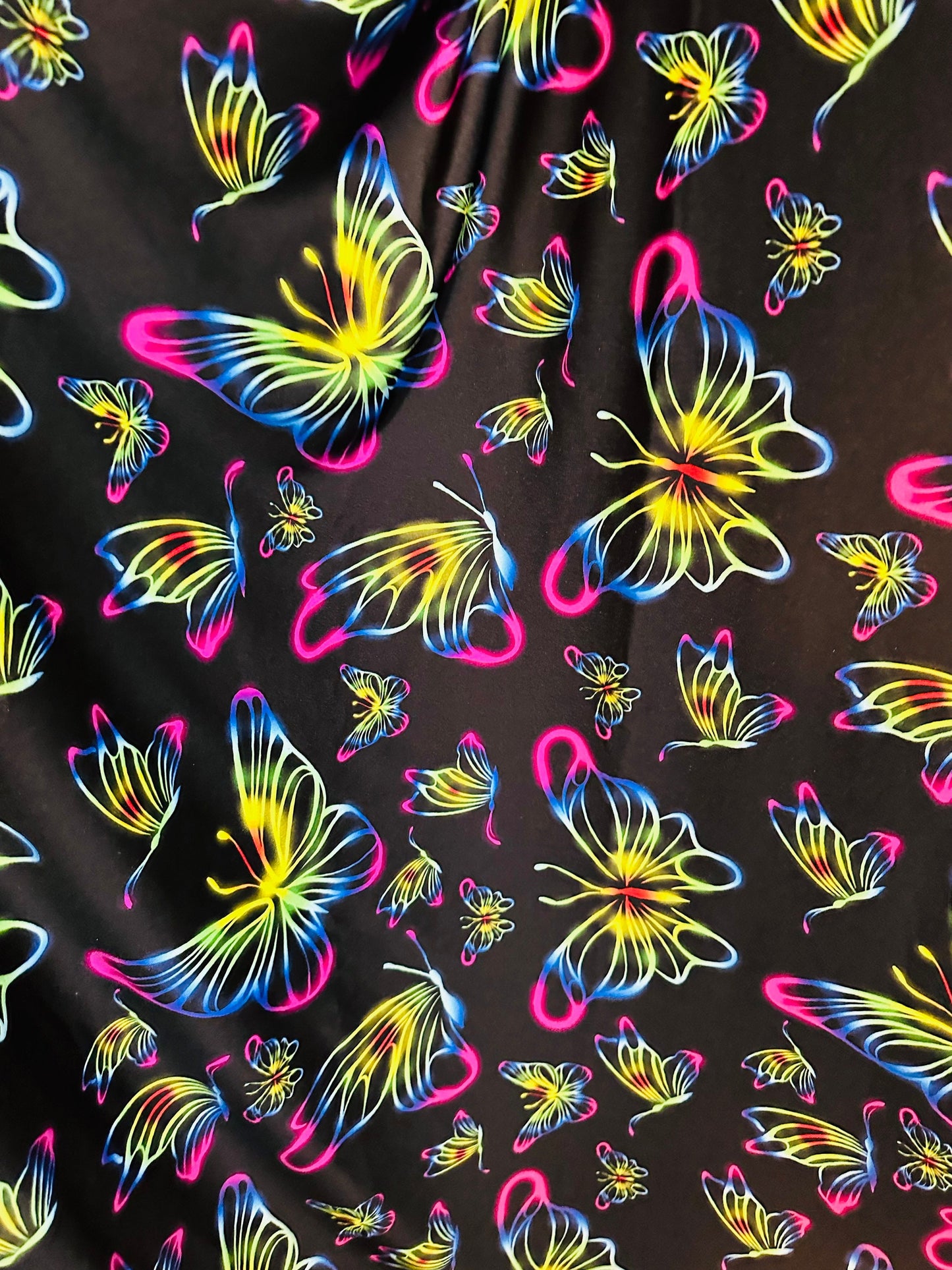 New Rainbow Butterfly design print on great quality of poly spandex 4-way stretch 58/60” Sold by the YD.