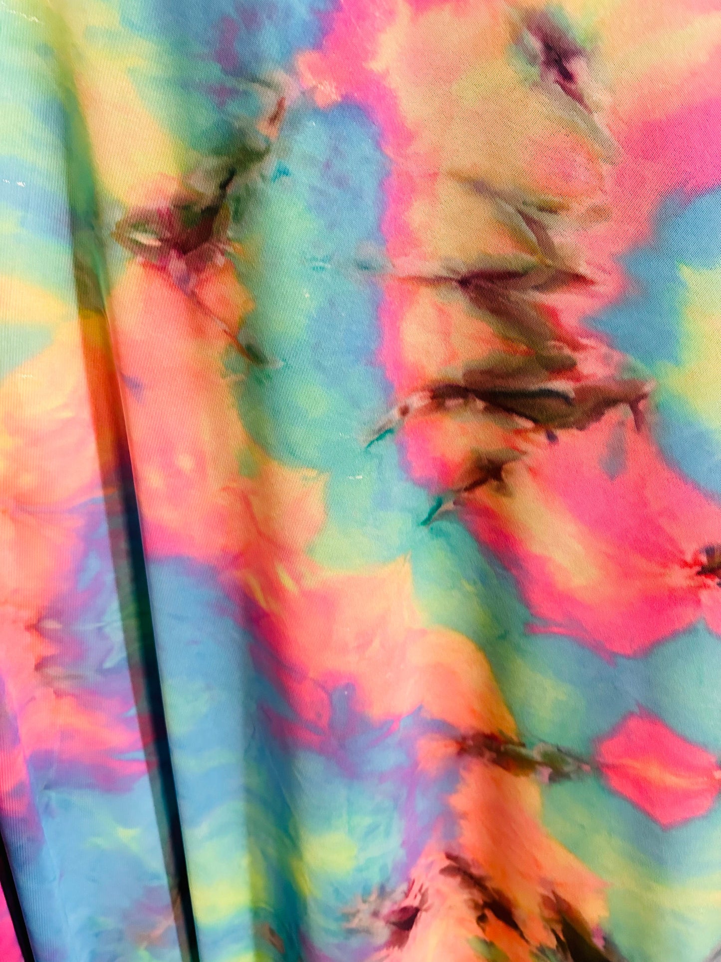 Tie dye multi pastel power mesh 4-way stretch 58/60” Sold by the YD.