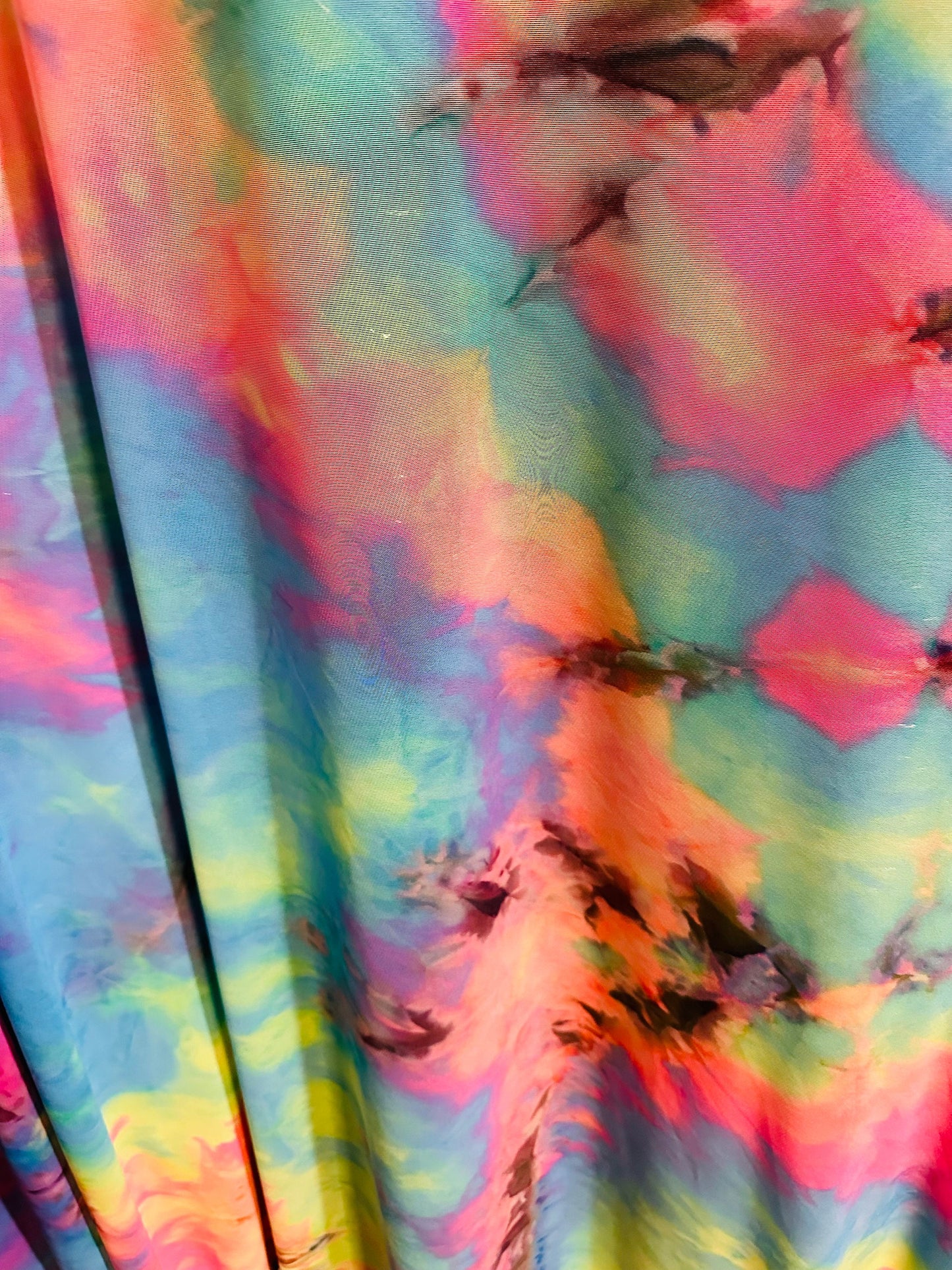 Tie dye multi pastel power mesh 4-way stretch 58/60” Sold by the YD.