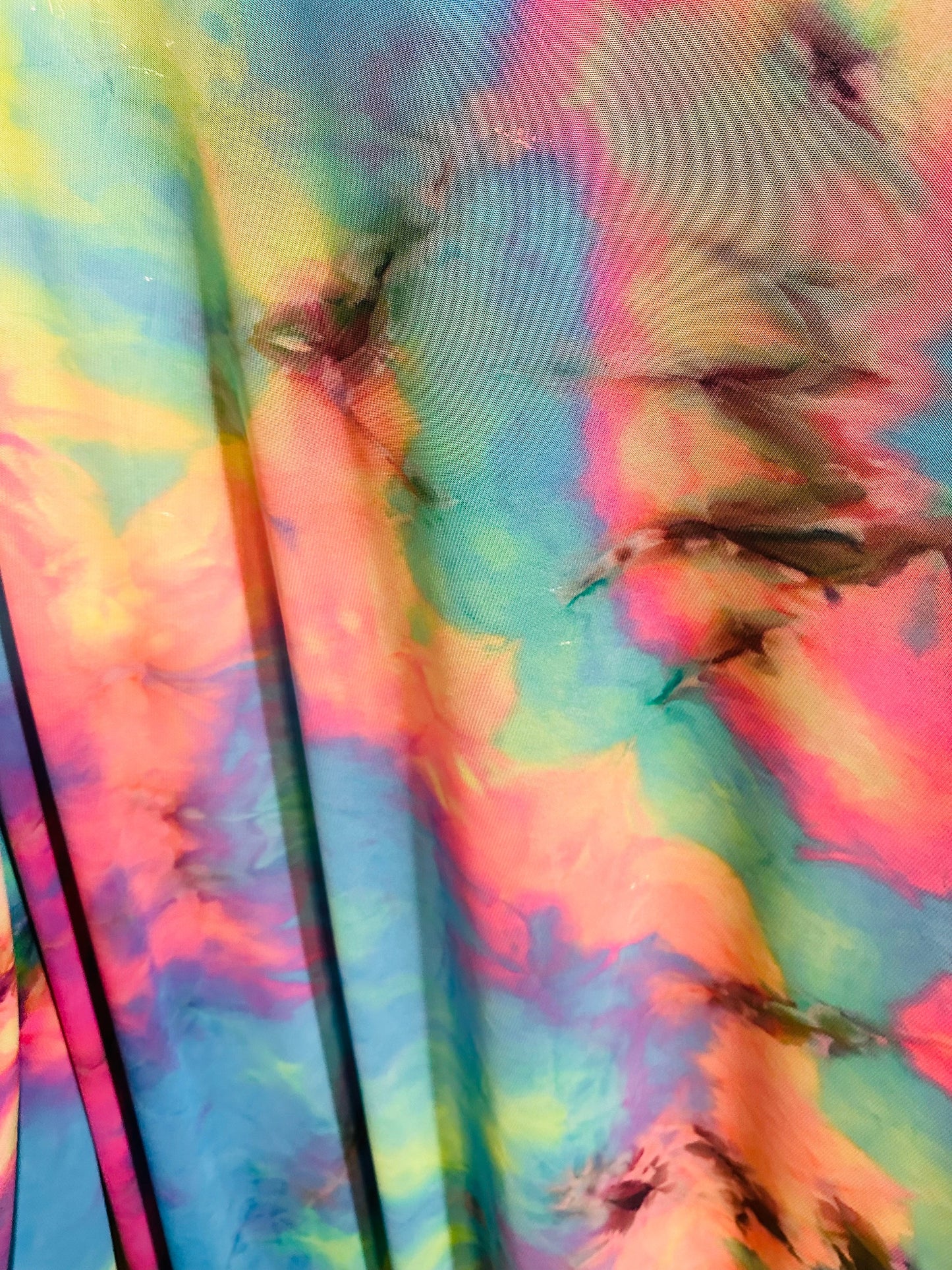 Tie dye multi pastel power mesh 4-way stretch 58/60” Sold by the YD.