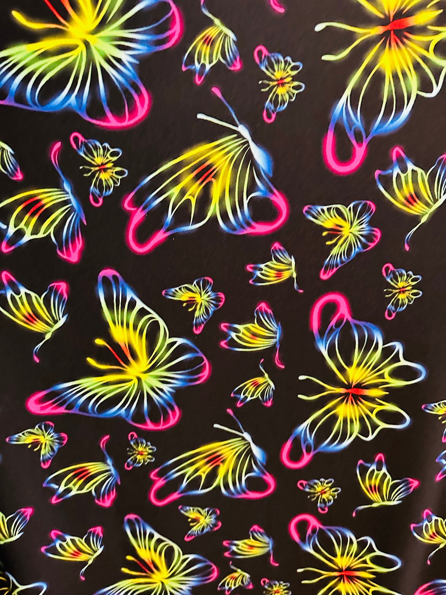 New Rainbow Butterfly design print on great quality of poly spandex 4-way stretch 58/60” Sold by the YD.